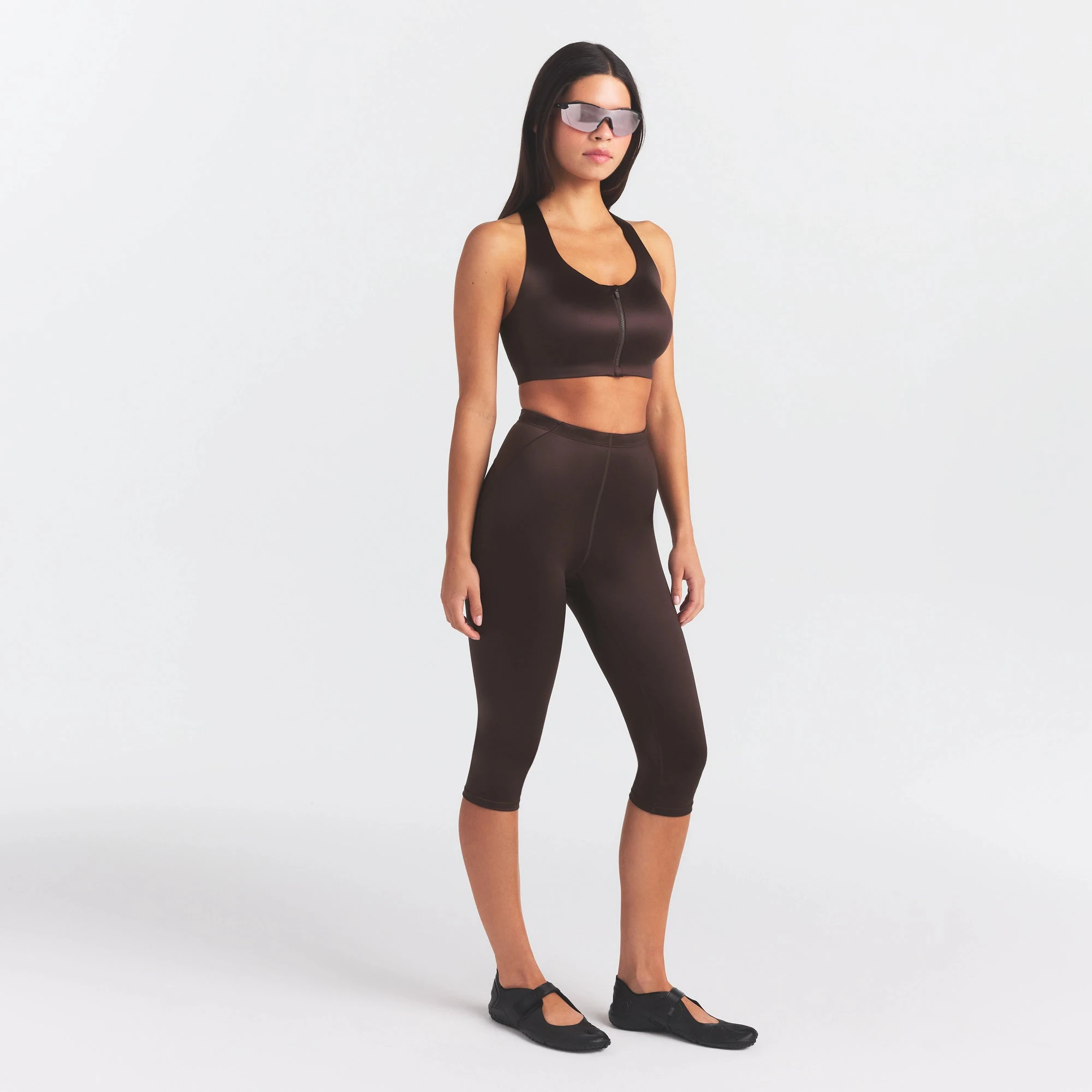 NikeSKIMS SATIN SHINE CAPRI 17" LEGGING | PHOENIX ON A MODEL FRONT VIEW