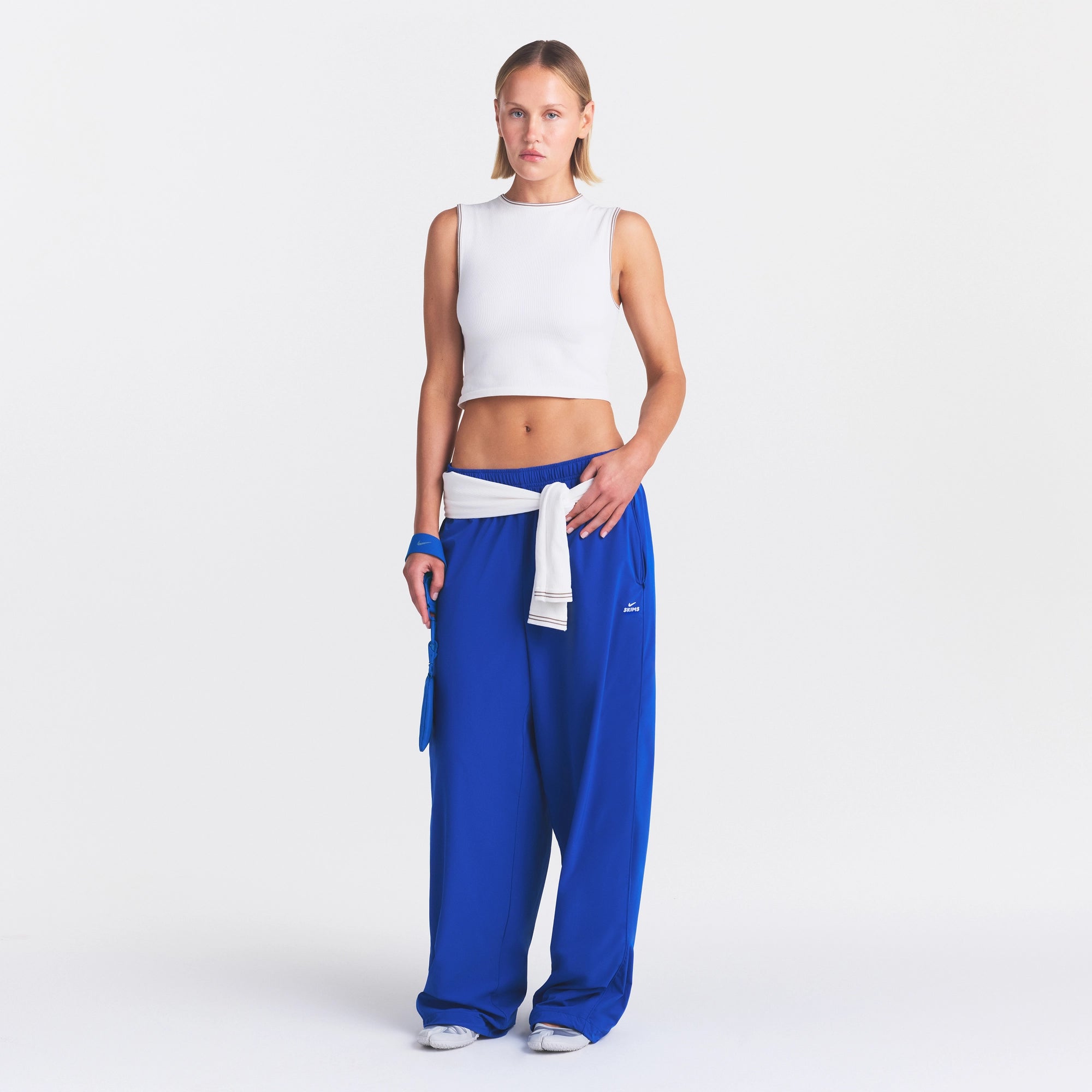 NikeSKIMS STRETCH NYLON OVERSIZED PANT | COBALT ON A MODEL FRONT VIEW @ | FOCUS: 0.0, 1.0, 0.9