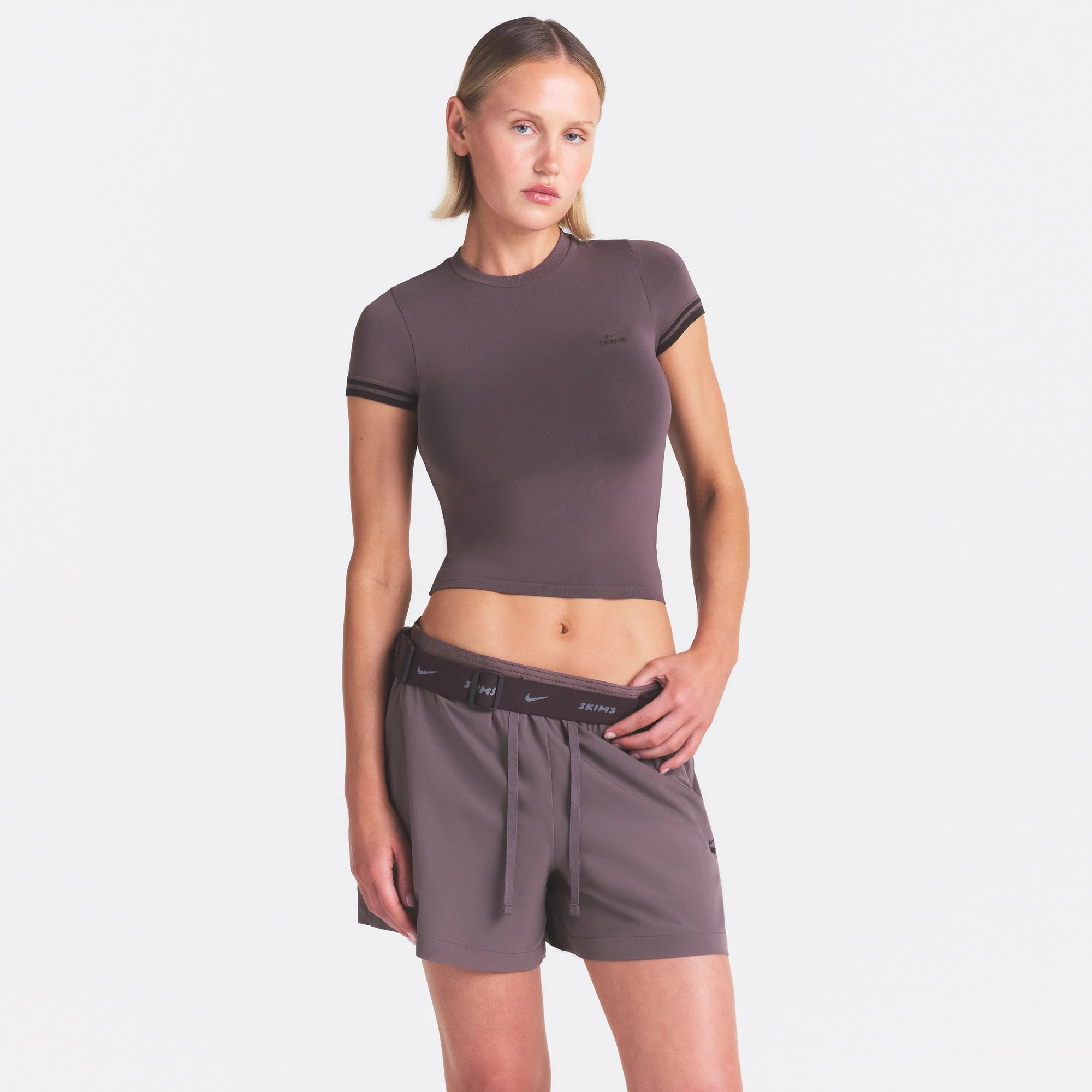 NikeSKIMS STRETCH NYLON 5" TRACK SHORT | RESIN ON A MODEL SIDE VIEW