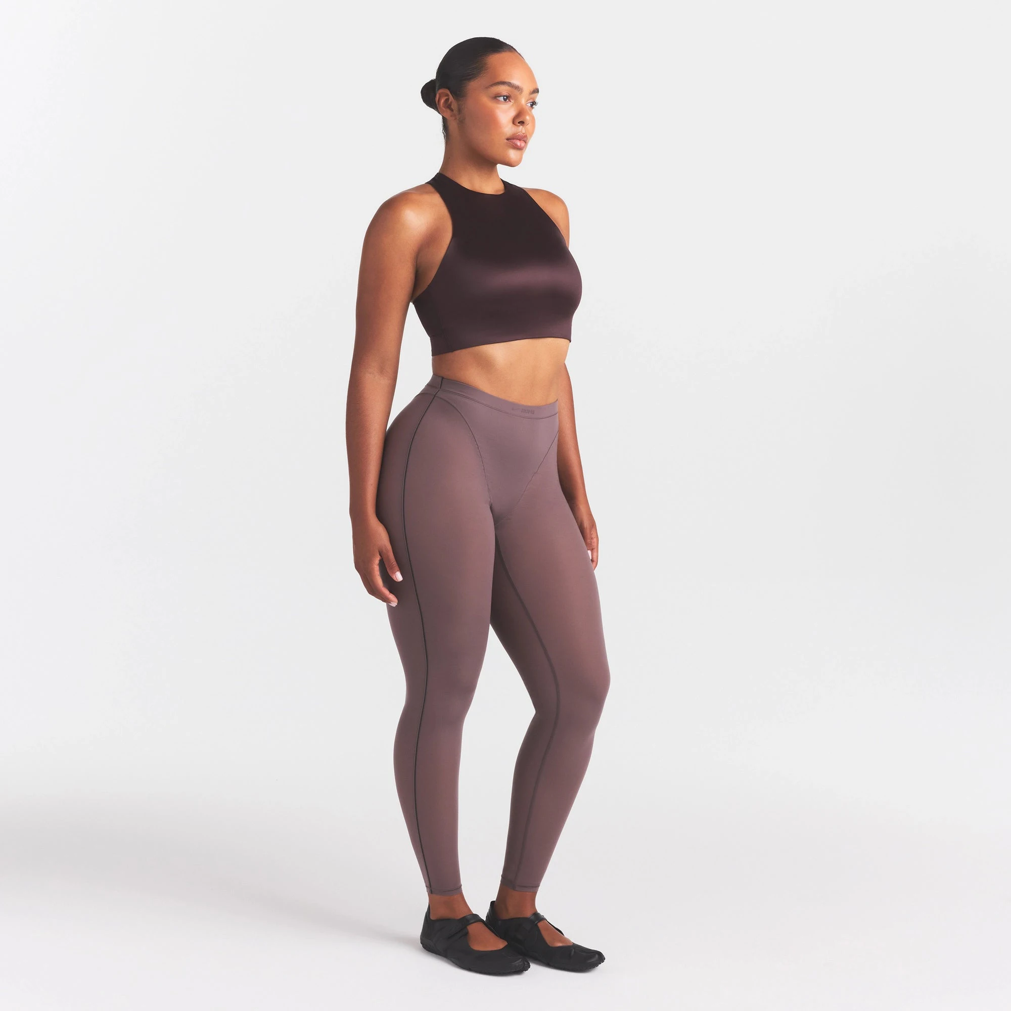 NikeSKIMS SATIN SHINE HIGH NECK BRA | PHOENIX ON A MODEL FRONT VIEW @ | FOCUS: 0.0, 1.0, 0.9