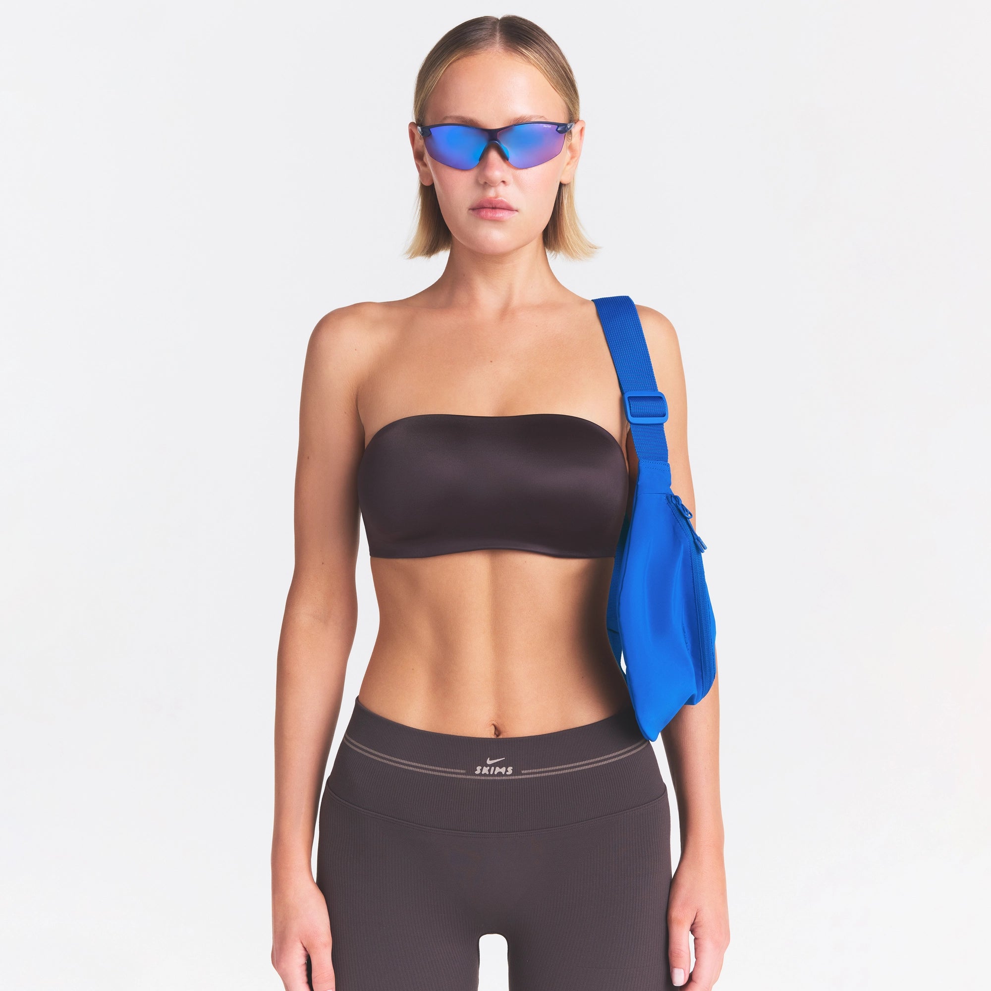 NikeSKIMS SATIN SHINE BANDEAU BRA | PHOENIX ON A MODEL SIDE VIEW @ | FOCUS: 0.0, 1.0, 0.9