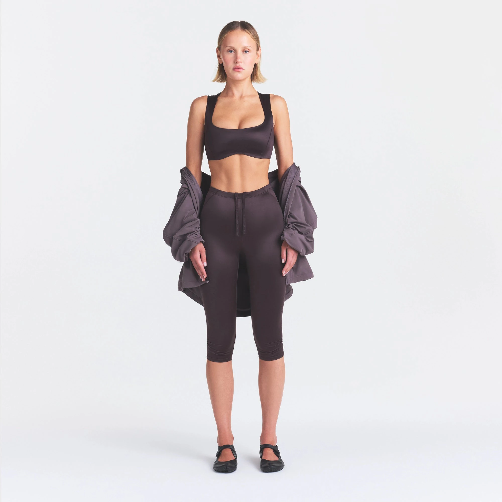 NikeSKIMS SATIN SHINE WIDE SCOOP BRA | PHOENIX ON A MODEL FRONT VIEW @ | FOCUS: 0.0, 1.0, 0.9