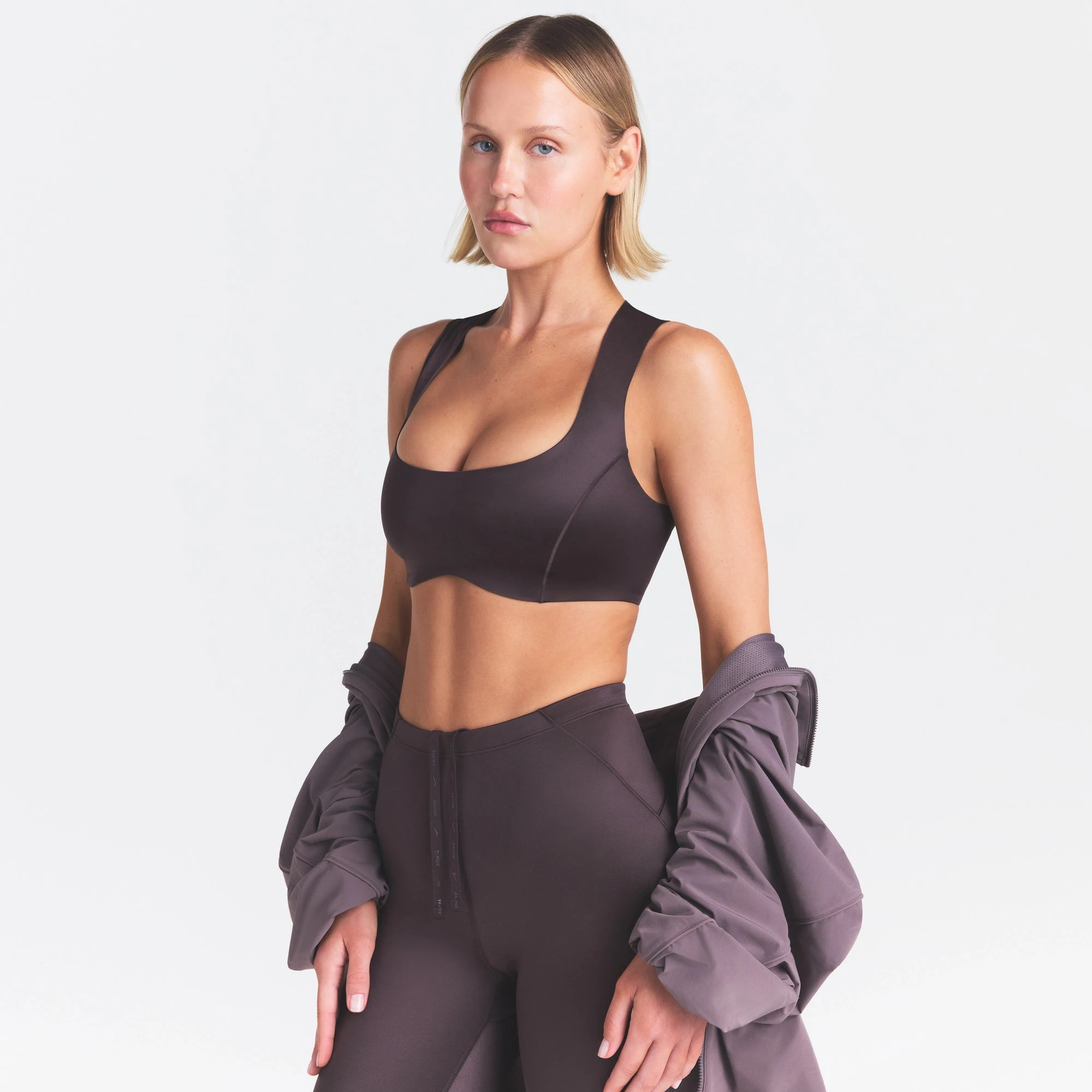 NikeSKIMS SATIN SHINE WIDE SCOOP BRA | PHOENIX ON A MODEL SIDE VIEW @ | FOCUS: 0.0, 1.0, 0.9