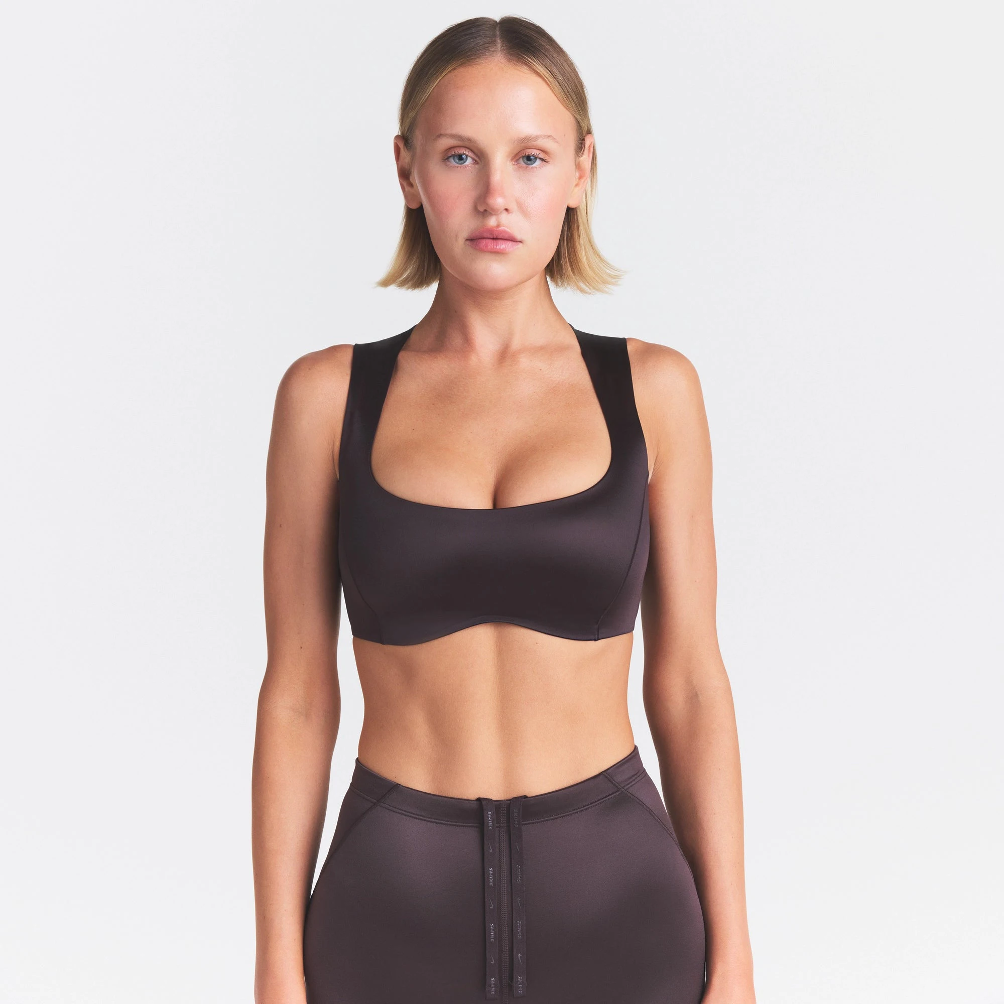 NikeSKIMS SATIN SHINE WIDE SCOOP BRA | PHOENIX ON A MODEL SIDE VIEW @ | FOCUS: 0.0, 1.0, 0.9