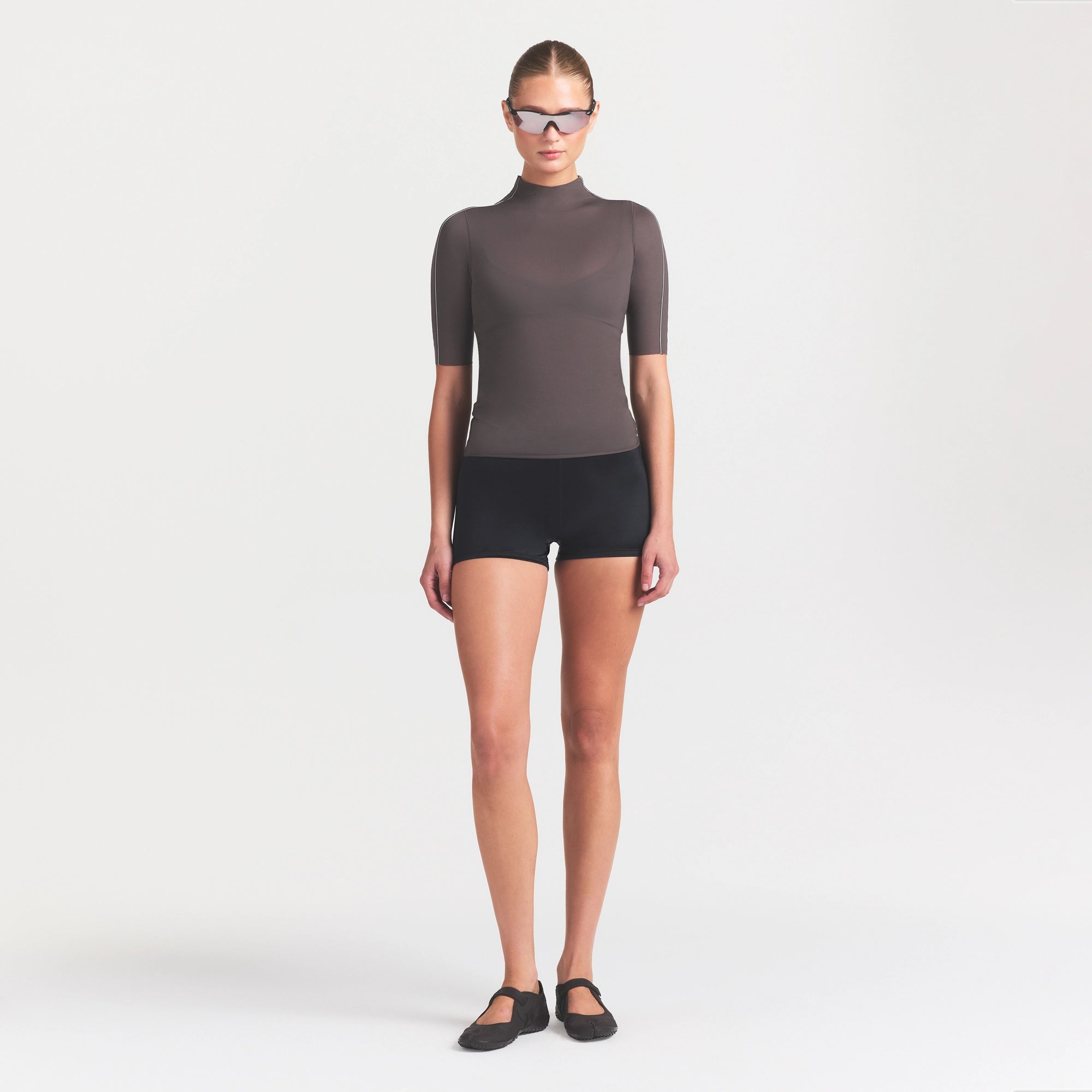 NikeSKIMS WEIGHTLESS LAYERS MOCK NECK SHORT SLEEVE T-SHIRT | BOULDER ON A MODEL FRONT VIEW @ | FOCUS: 0.0, 1.0, 0.9
