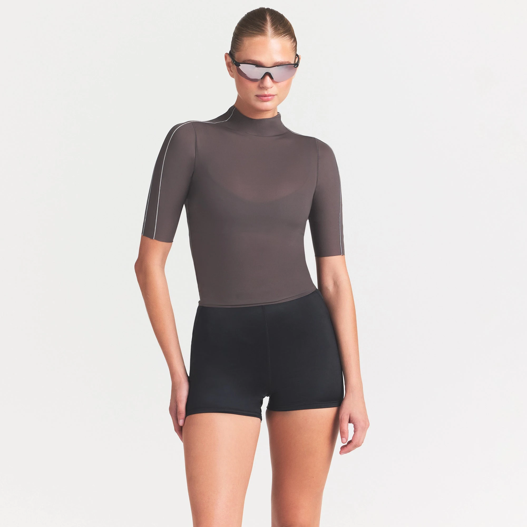 NikeSKIMS WEIGHTLESS LAYERS MOCK NECK SHORT SLEEVE T-SHIRT | BOULDER ON A MODEL SIDE VIEW @ | FOCUS: 0.0, 1.0, 0.9