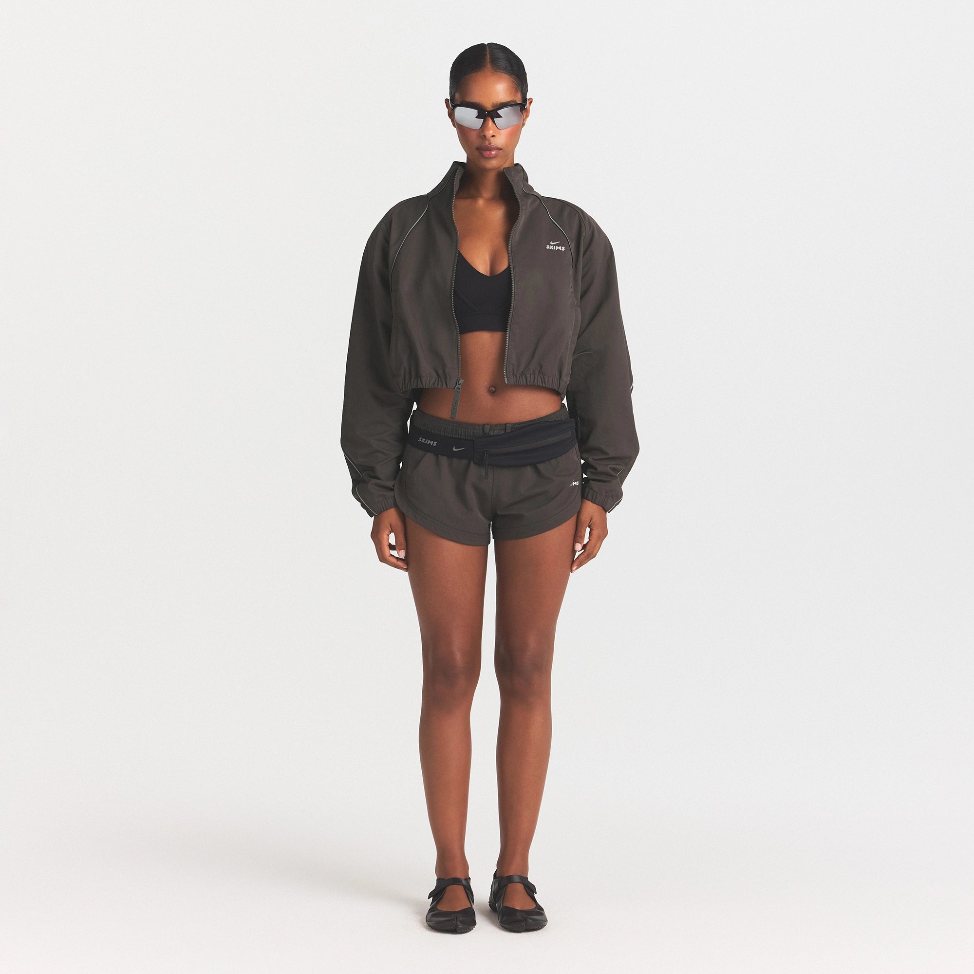 NikeSKIMS CRUNCHY NYLON CROP JACKET | BOULDER ON A MODEL FRONT VIEW @ | FOCUS: 0.0, 1.0, 0.9