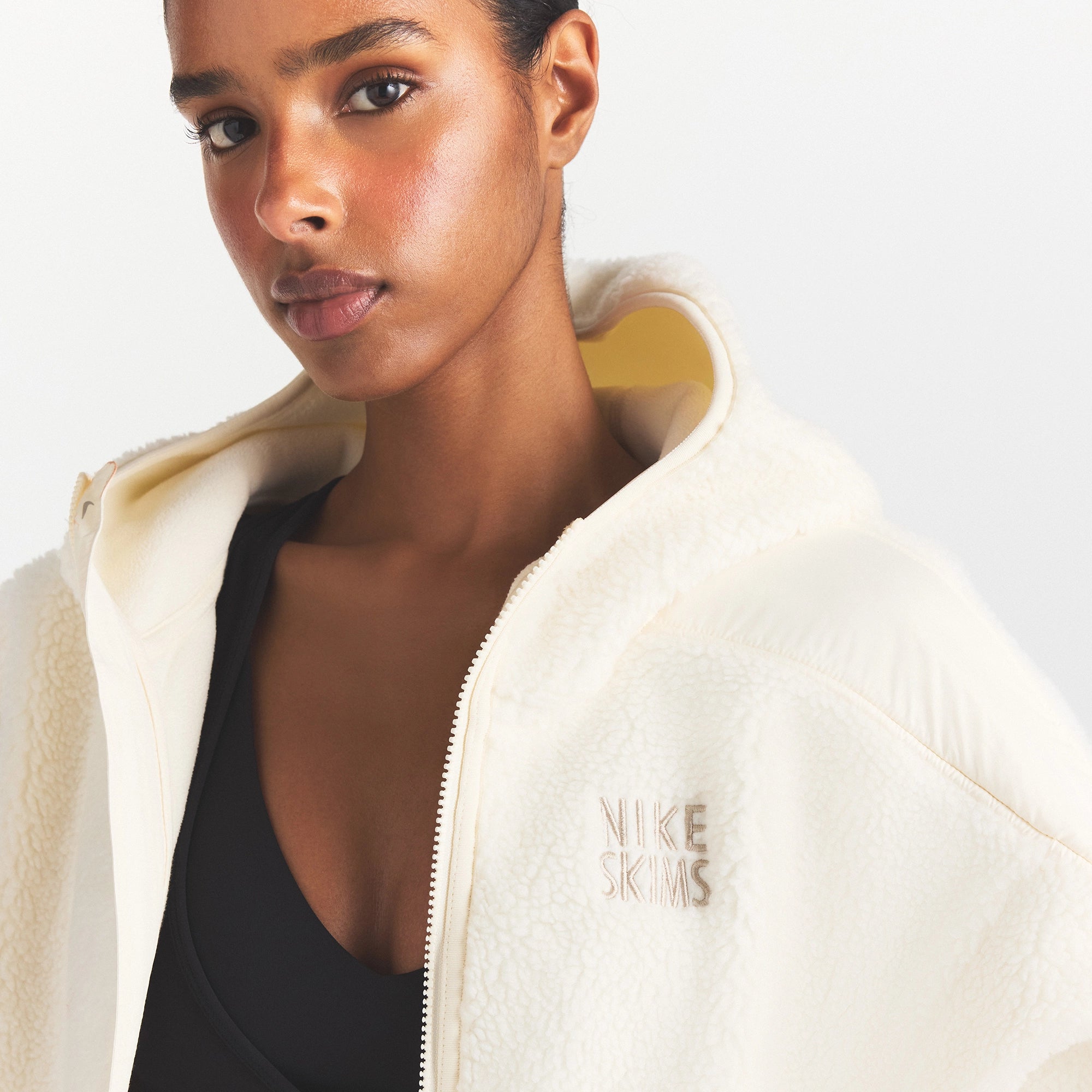 NikeSKIMS SHERPA HOODED JACKET | ECRU/ECRU ON A MODEL SIDE VIEW @ | FOCUS: 0.0, 1.0, 0.9