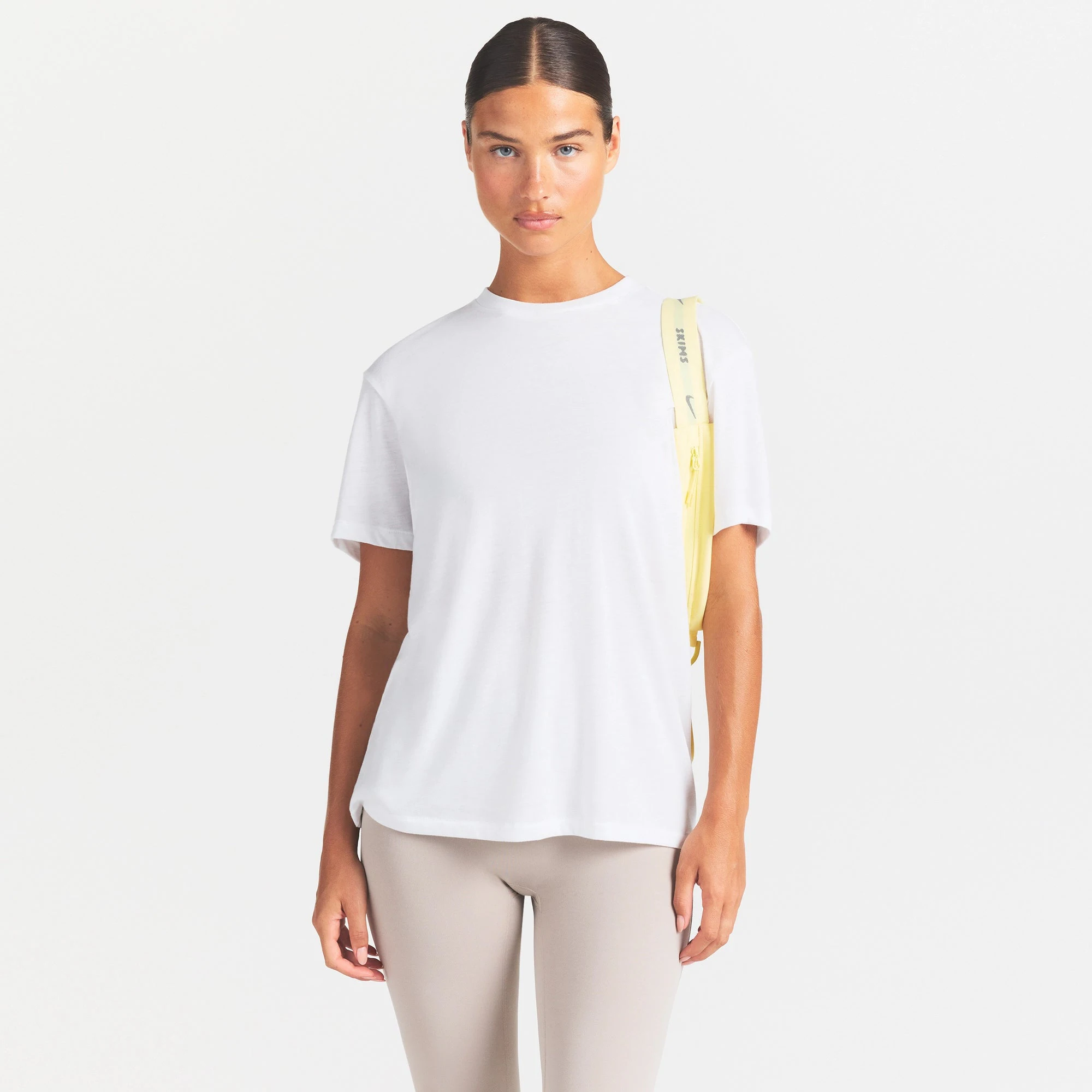NikeSKIMS PERFORMANCE COTTON BLEND OVERSIZED SHORT SLEEVE TOP | SNOW ON A MODEL SIDE VIEW @ | FOCUS: 0.0, 1.0, 0.9