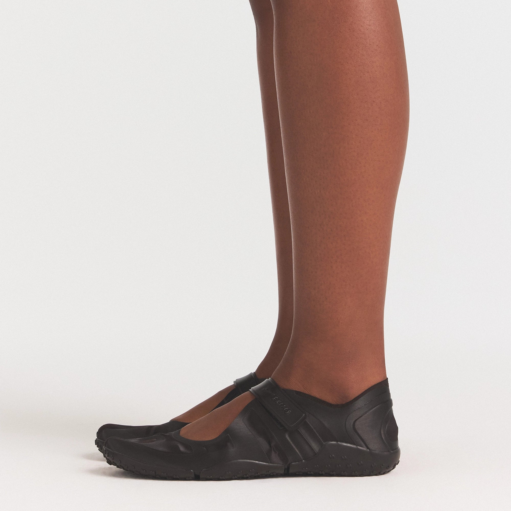 NIKESKIMS FOOTWEAR RIFT SATIN | SHADOW BROWN & LAYS FLAT ON A WHITE BACKGROUND | FLT