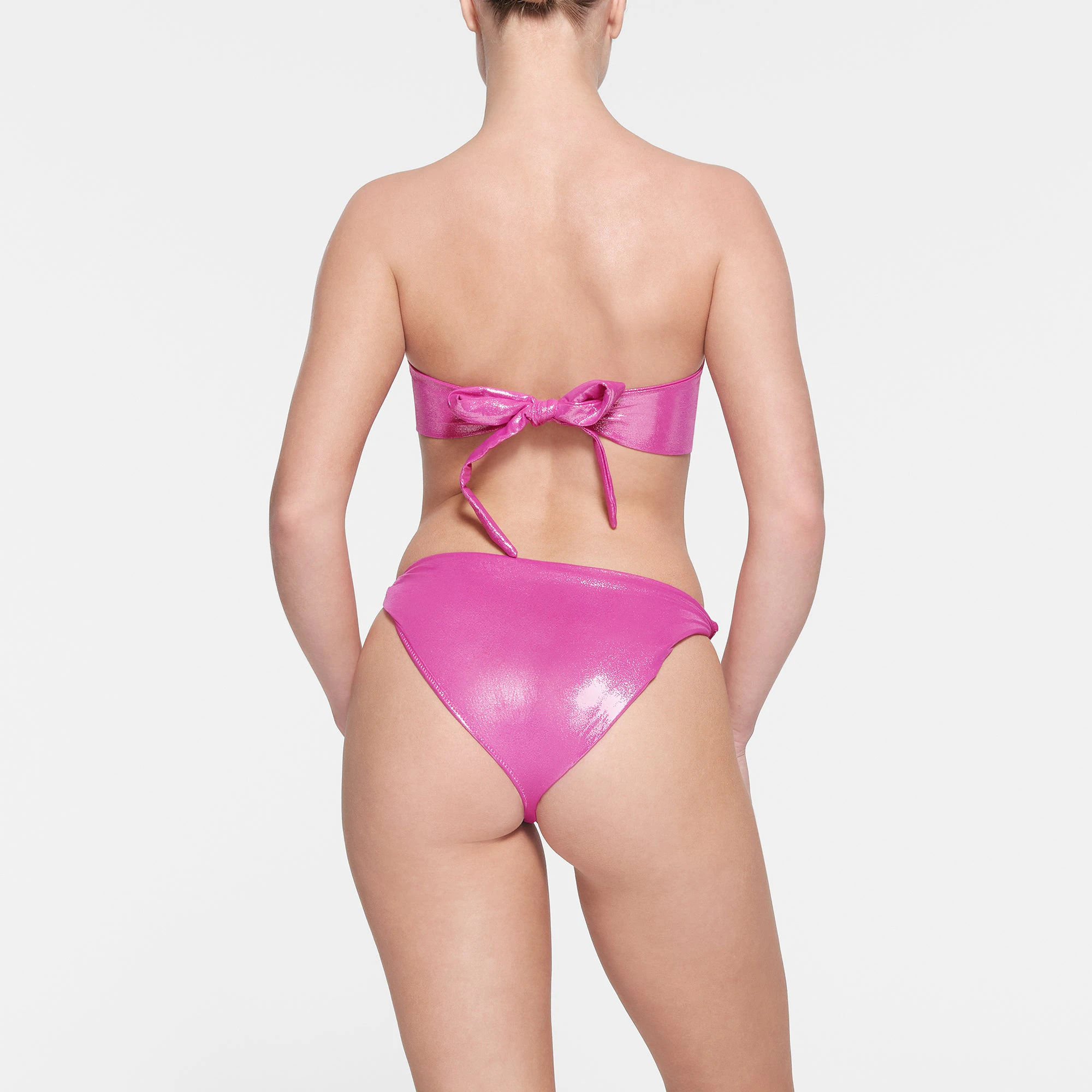 LIQUID SHINE SWIM STRAPLESS CUT OUT MONOKINI | LOLLIPOP ON A MODEL BACK VIEW