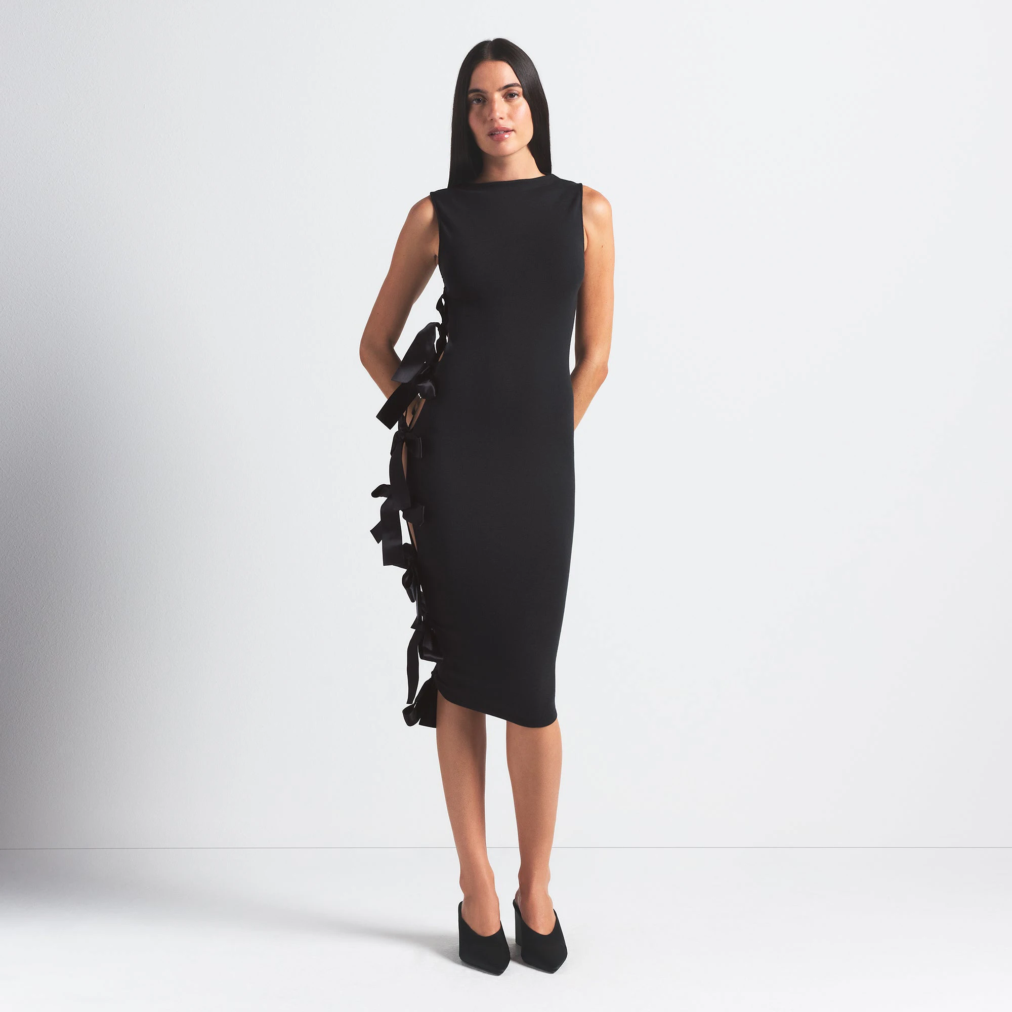SKIMS CLOUD BOW DRESS | ONYX ON A MODEL FRONT VIEW @ | FOCUS: 0.0, 1.0, 0.9