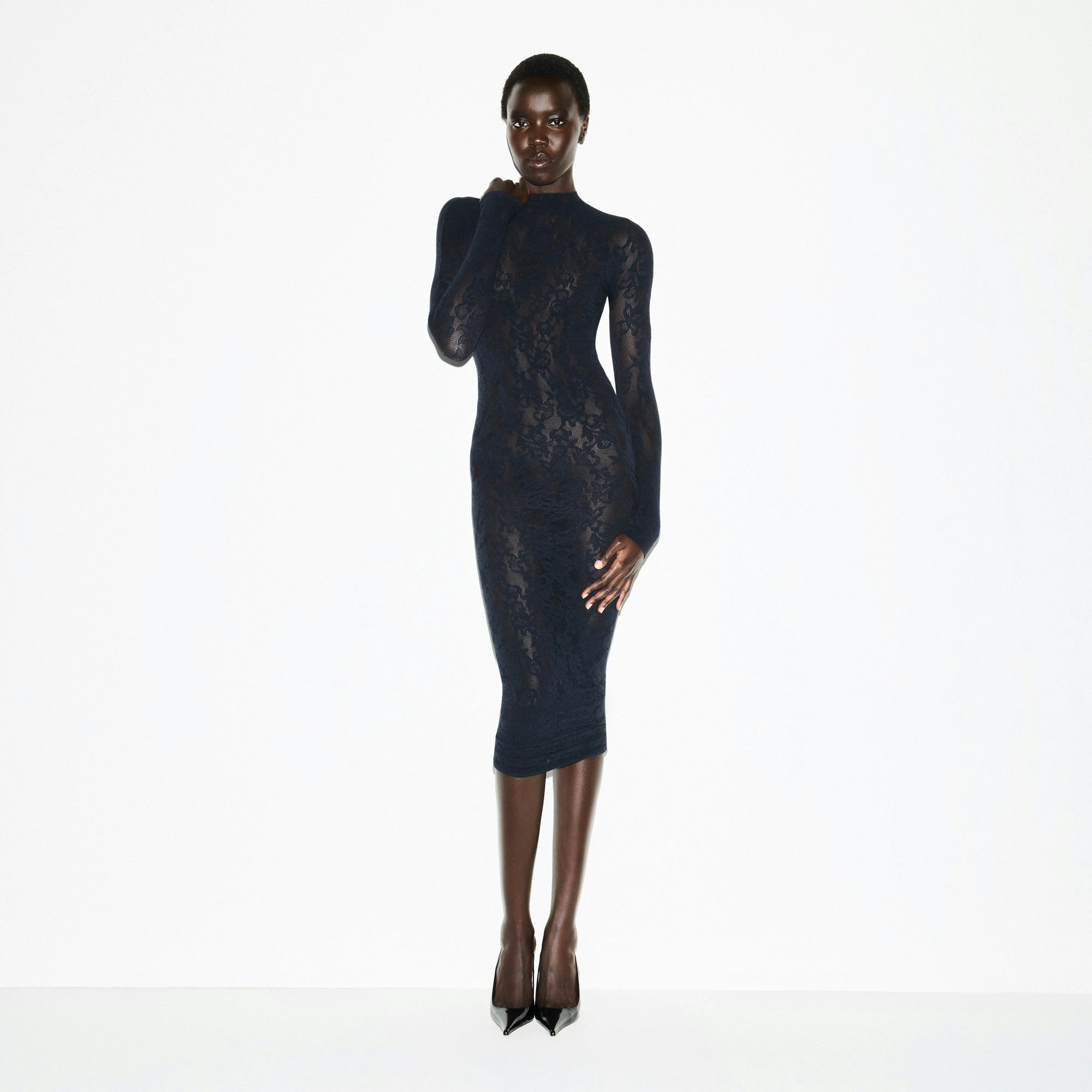 KNIT LACE MOCK NECK LONG DRESS | OBSIDIAN ON A MODEL SIDE VIEW @ | FOCUS: 0.0, 1.0, 0.9
