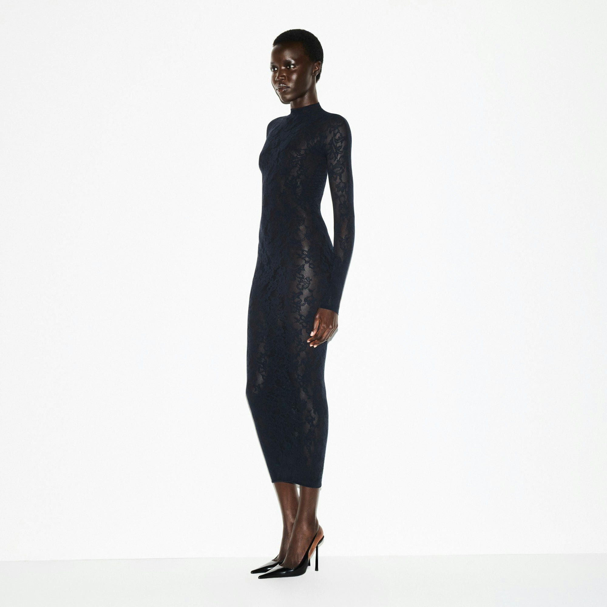 KNIT LACE MOCK NECK LONG DRESS | OBSIDIAN ON A MODEL SIDE VIEW @ | FOCUS: 0.0, 1.0, 0.9