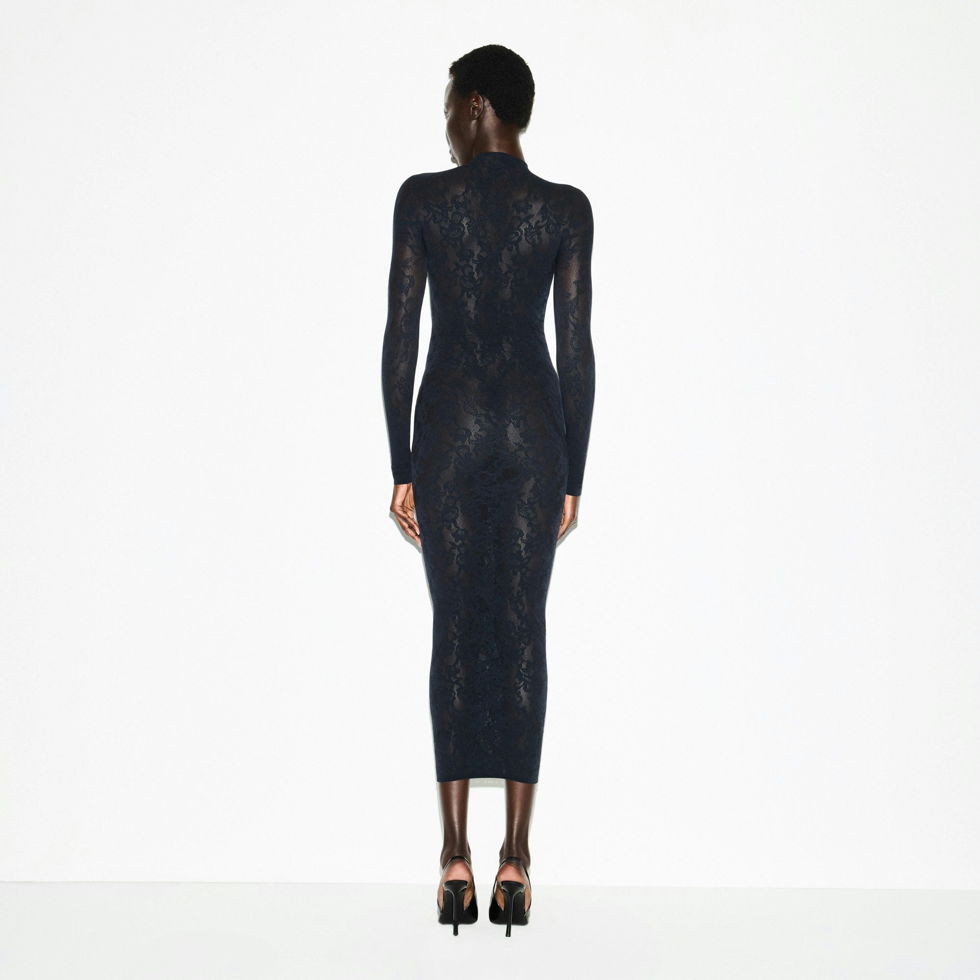KNIT LACE MOCK NECK LONG DRESS | OBSIDIAN ON A MODEL SIDE VIEW @ | FOCUS: 0.0, 1.0, 0.9