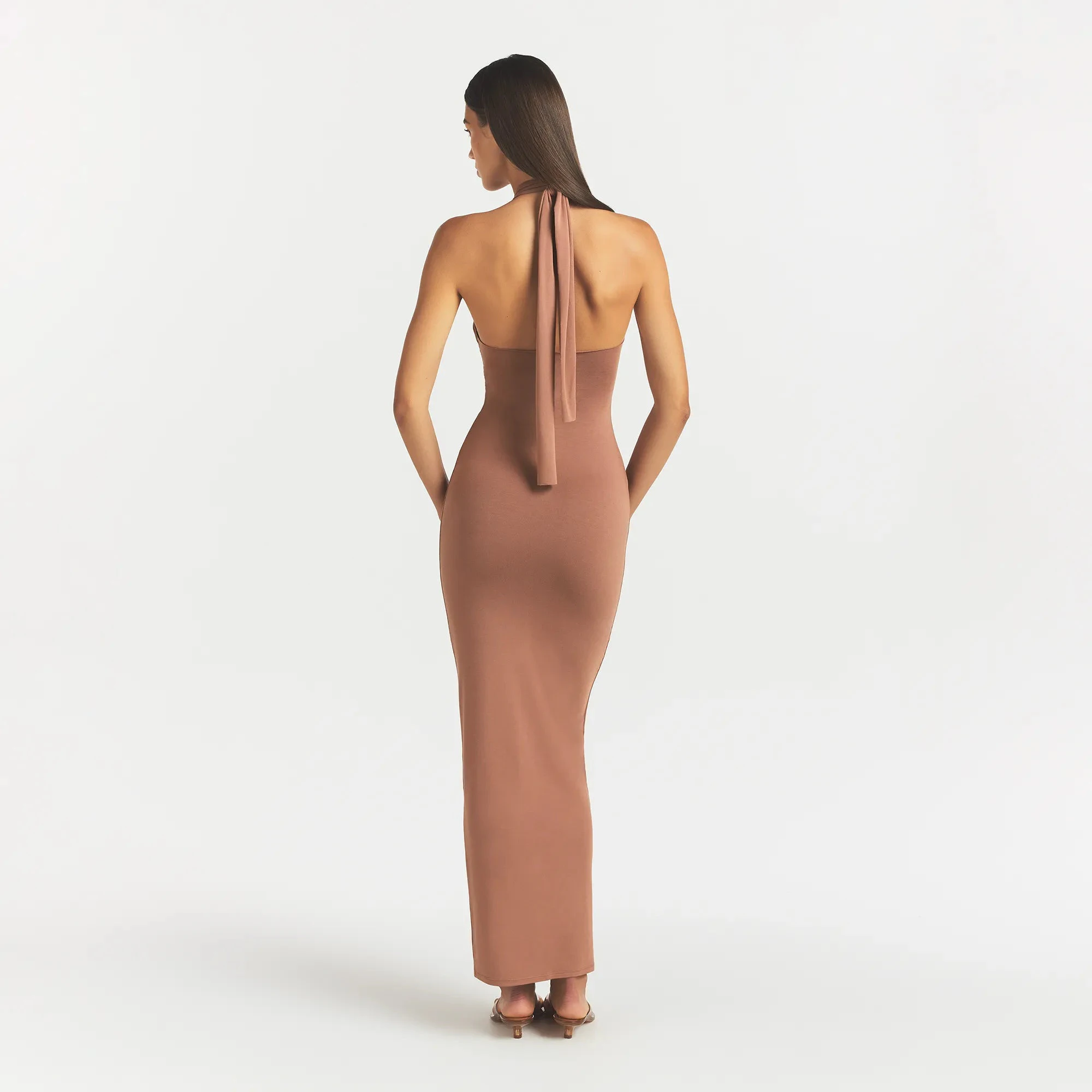 SMOOTH LAYERS CONVERTIBLE LONG DRESS | NUTMEG ON A MODEL BACK VIEW @ | FOCUS: 0.0, 1.0, 0.9
