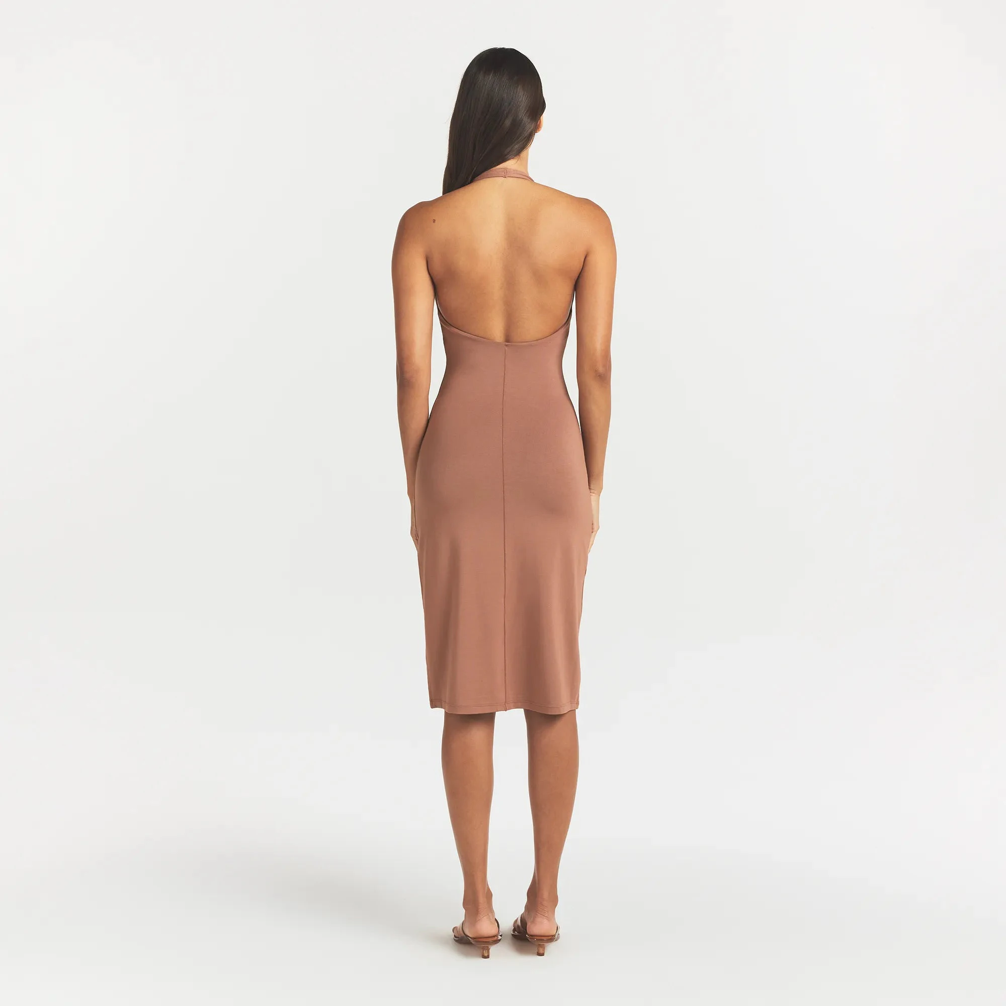 SMOOTH LAYERS HALTER MIDI DRESS | NUTMEG ON A MODEL BACK VIEW @ | FOCUS: 0.0, 1.0, 0.9