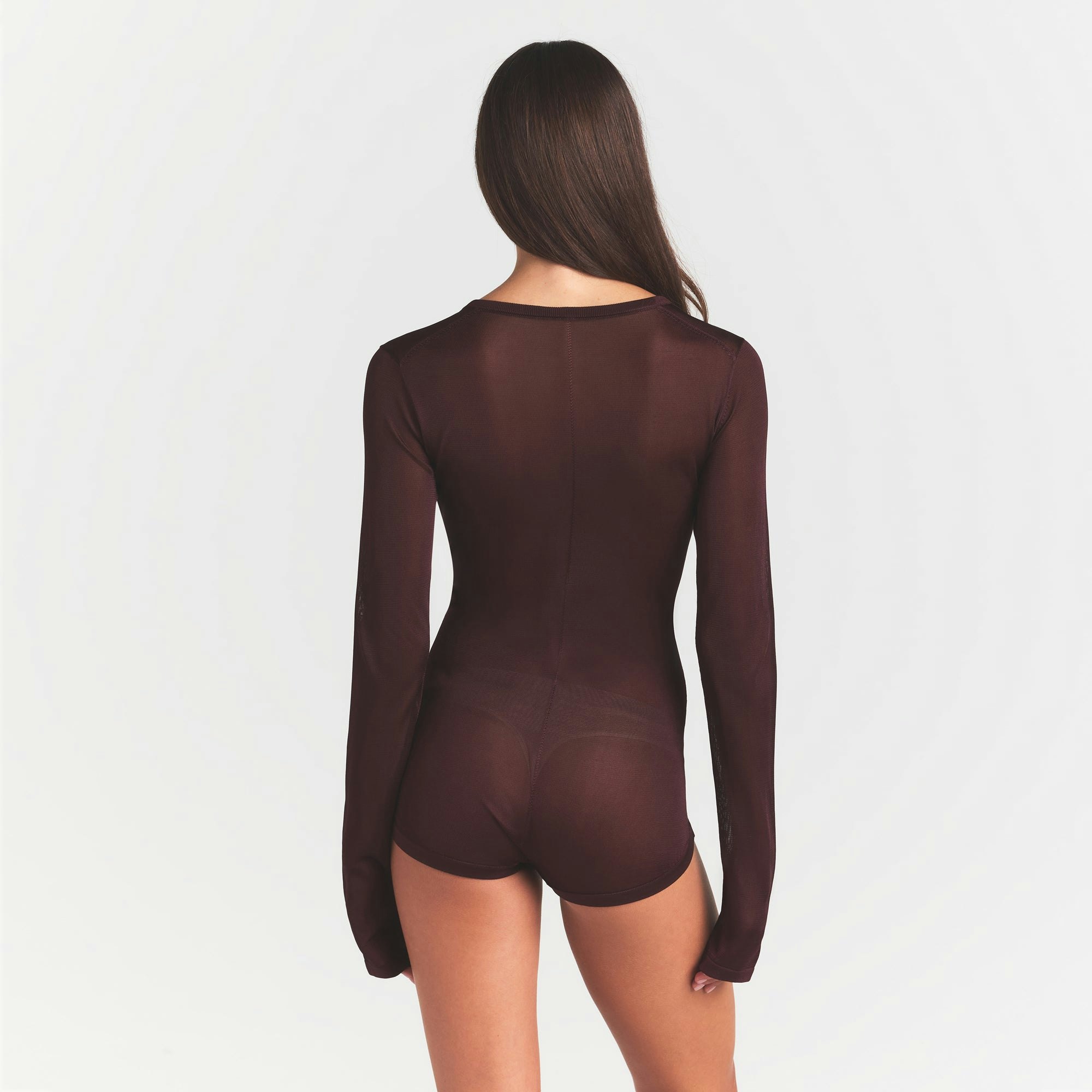 SLINKY KNIT BUTTON UP HENLEY ONESIE | CURRANT ON A MODEL SIDE VIEW @ | FOCUS: 0.0, 1.0, 0.9