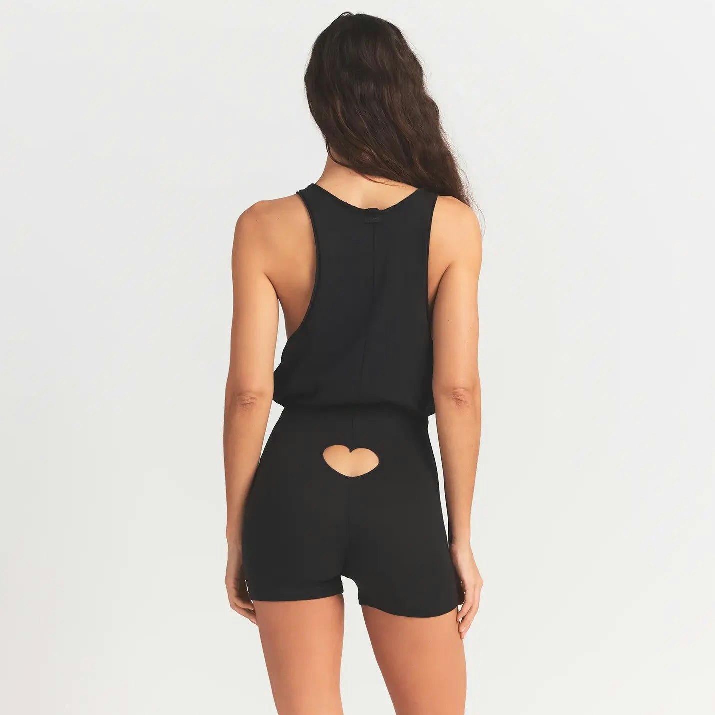 WORN IN JERSEY HEART ONESIE | WASHED ONYX ON A MODEL BACK VIEW @ | FOCUS: 0.0, 1.0, 0.9