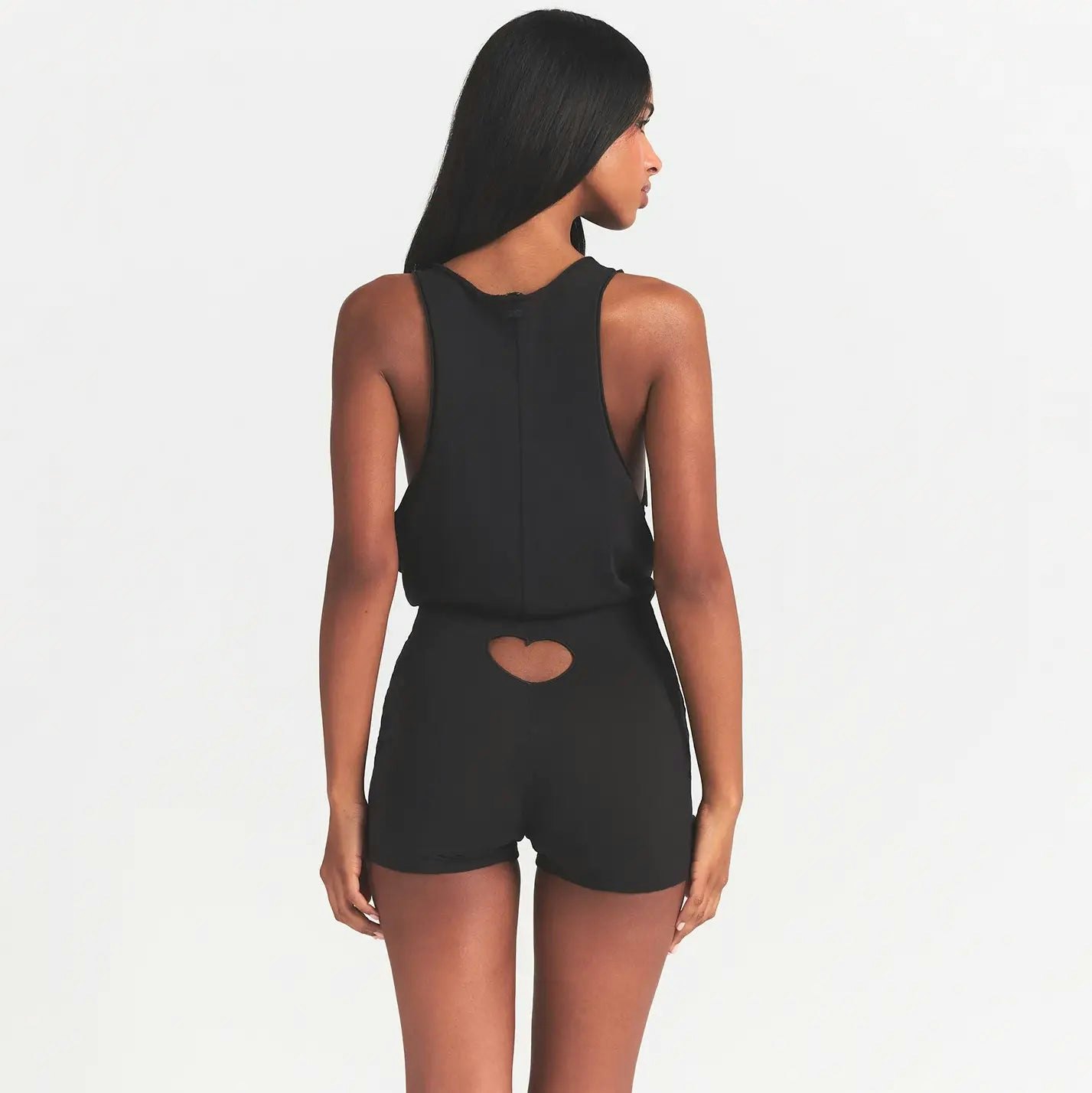 WORN IN JERSEY HEART ONESIE | WASHED ONYX ON A MODEL BACK VIEW @ | FOCUS: 0.0, 1.0, 0.9