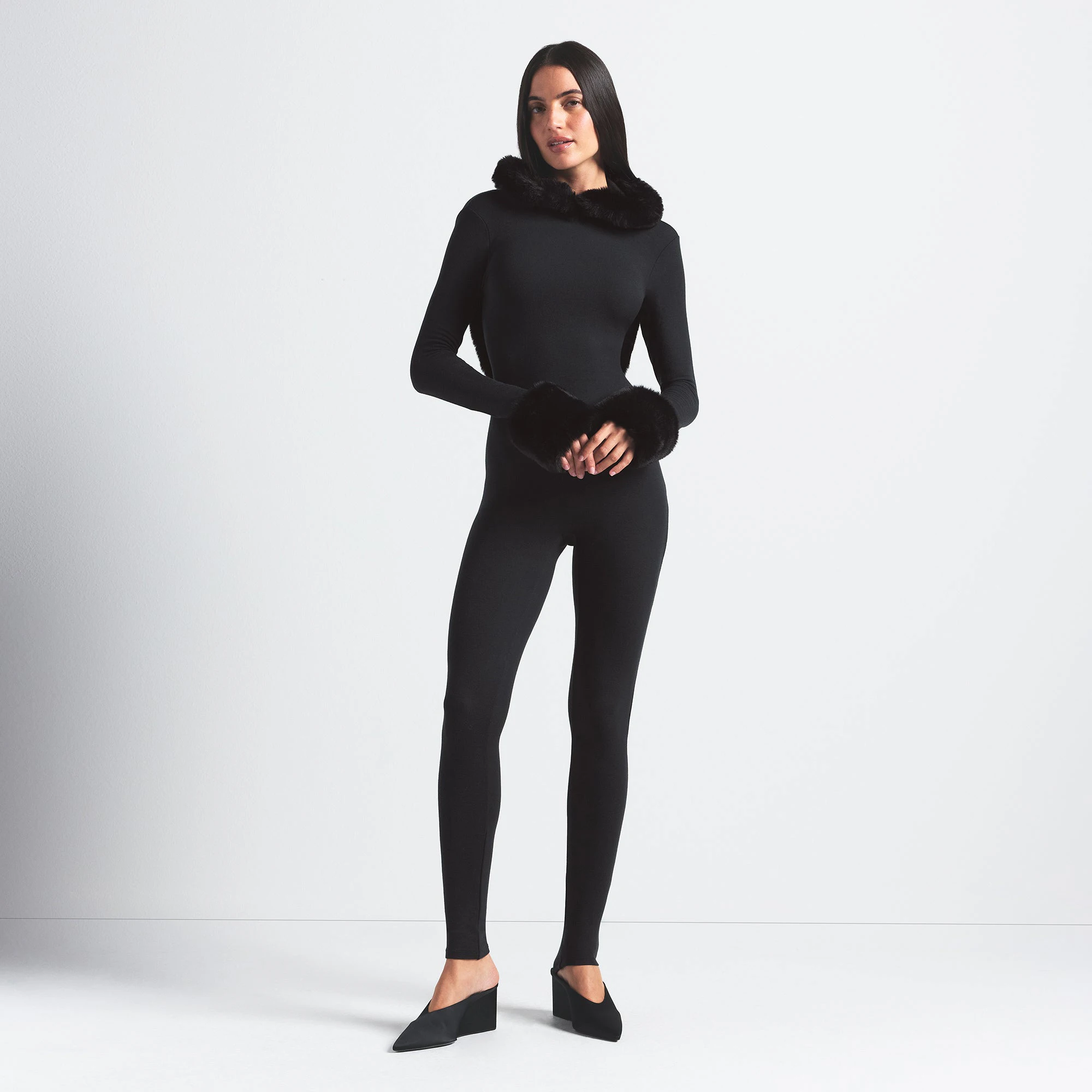 SKIMS CLOUD HOODED CATSUIT | ONYX ON A MODEL FRONT VIEW @ | FOCUS: 0.0, 1.0, 0.9