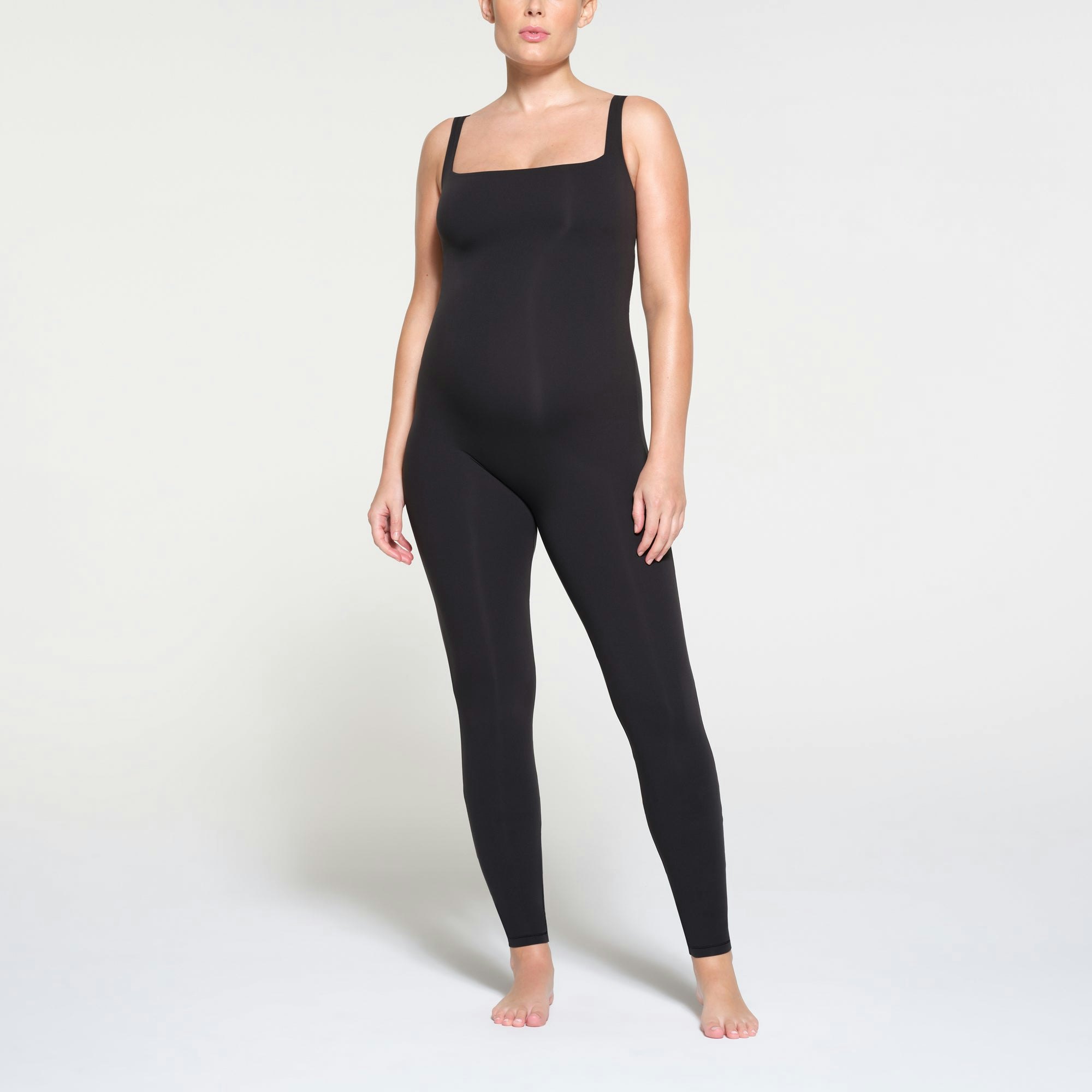 FITS EVERYBODY MATERNITY CATSUIT | ONYX ON A MODEL FRONT VIEW
