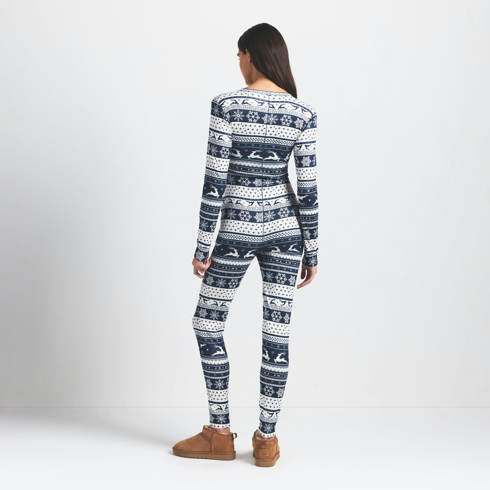 LOGO PLUSH POINTELLE HENLEY ONESIE | NAVY DEER FAIR ISLE ON A MODEL BACK VIEW @ | FOCUS: 0.0, 1.0, 0.9