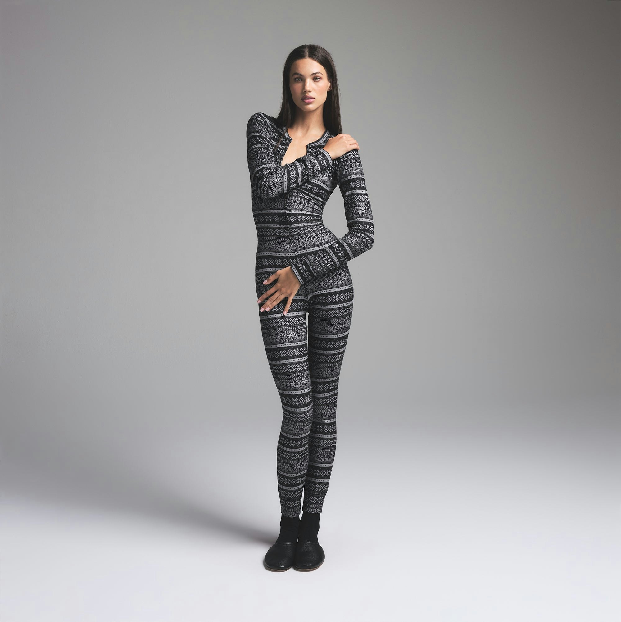 LOGO PLUSH POINTELLE HENLEY ONESIE | ONYX MIRROR FAIR ISLE ON A MODEL FRONT VIEW | FOCUS: 0.0, 1.0, 0.9
