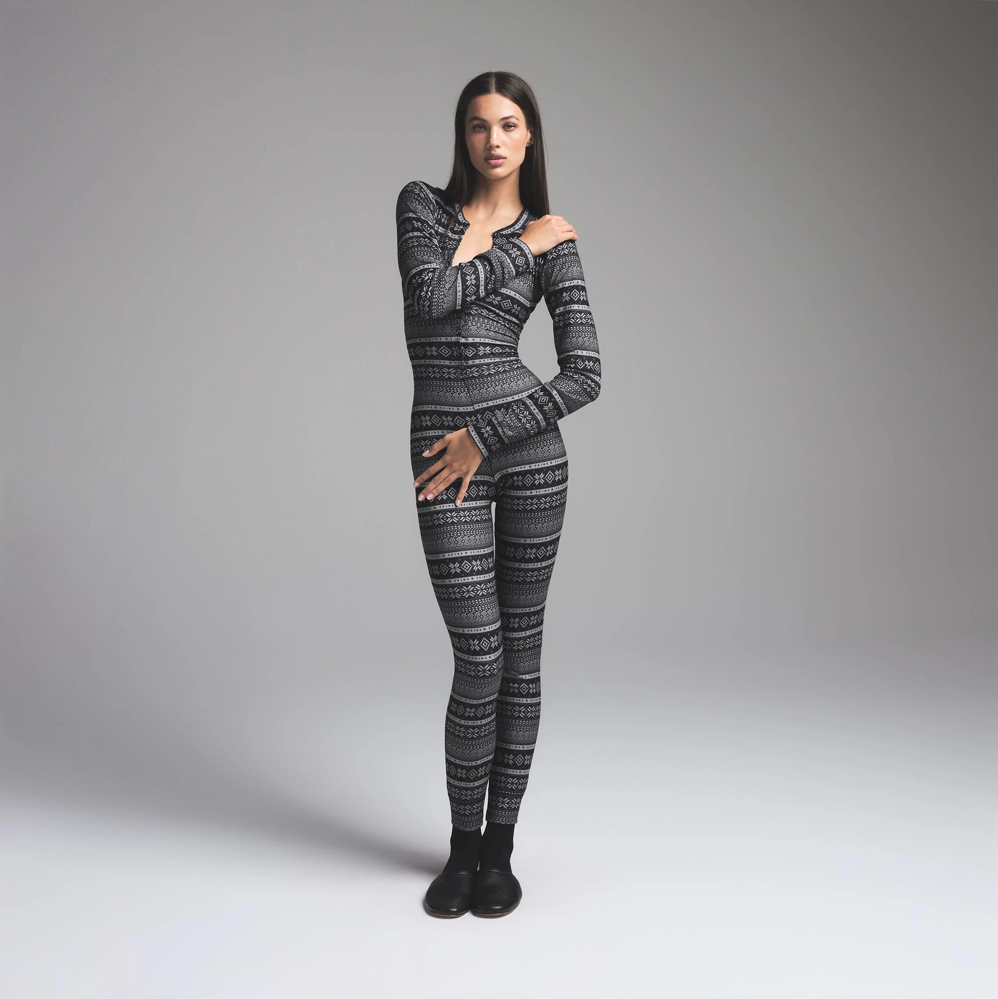 LOGO PLUSH POINTELLE HENLEY ONESIE | ONYX MIRROR FAIR ISLE ON A MODEL FRONT VIEW | FOCUS: 0.0, 1.0, 0.9