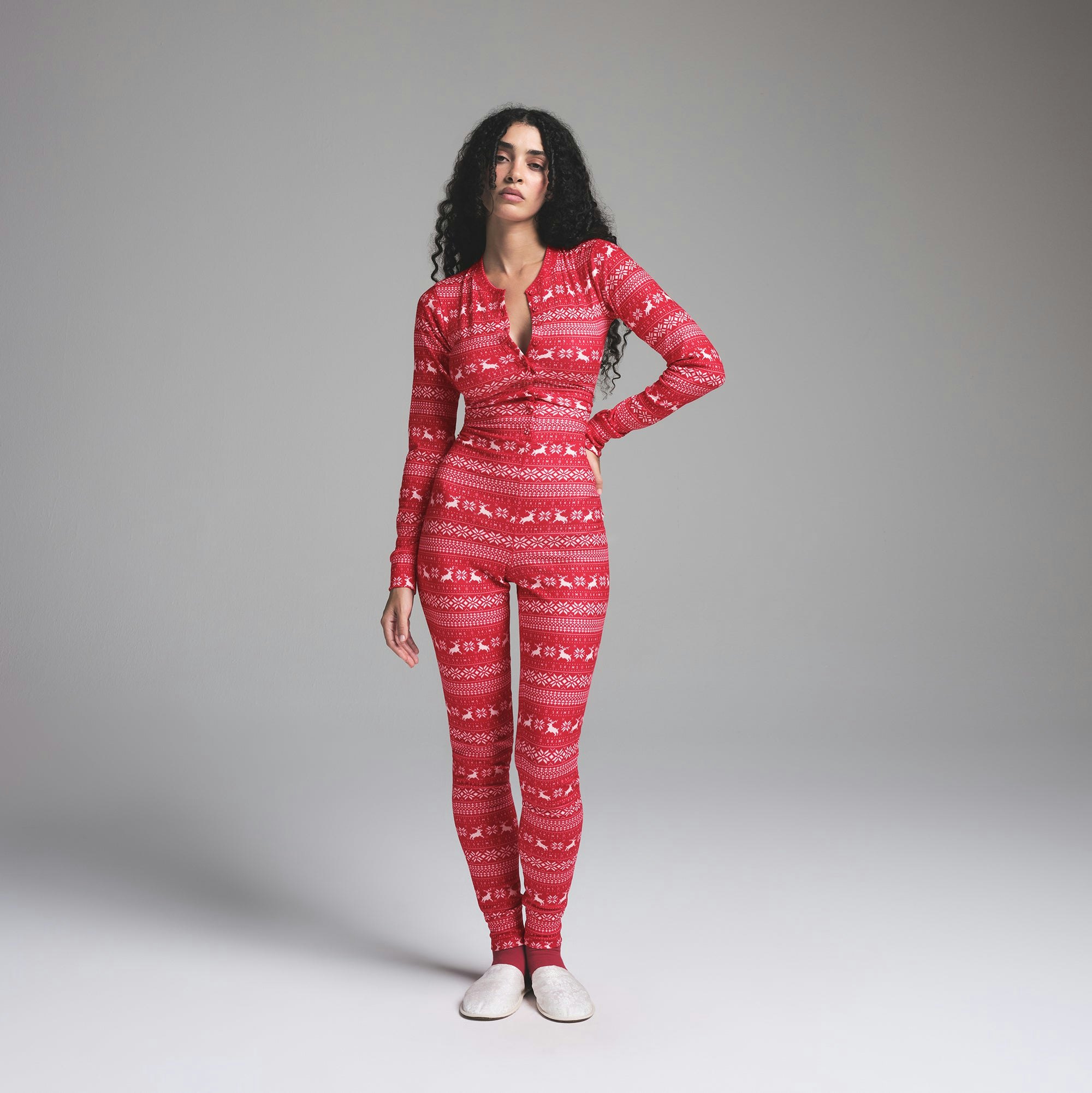 LOGO PLUSH POINTELLE HENLEY ONESIE | RED DEER FAIR ISLE ON A MODEL FRONT VIEW | FOCUS: 0.0, 1.0, 0.9
