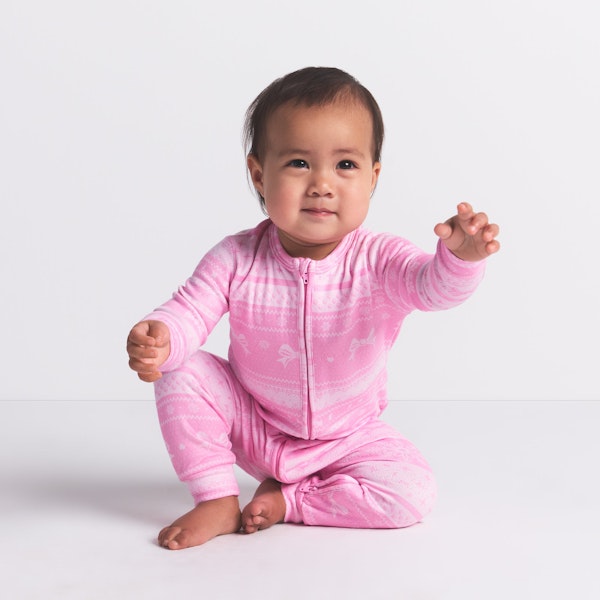 LOGO PLUSH POINTELLE BABY ONESIE | BUBBLE GUM BOW FAIR ISLE ON A MODEL FRONT VIEW