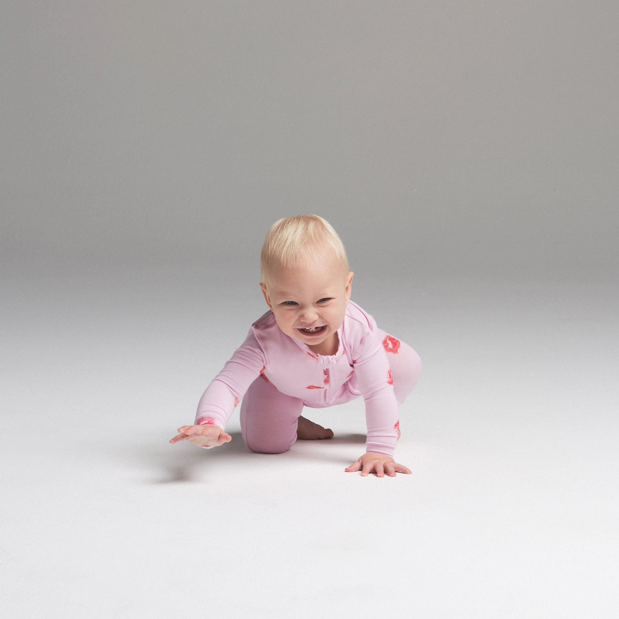 SKIMS SLEEP BABY ONESIE | CHERRY BLOSSOM LIPSTICK ON A MODEL SIDE VIEW | FOCUS: 0.0, 1.0, 0.9