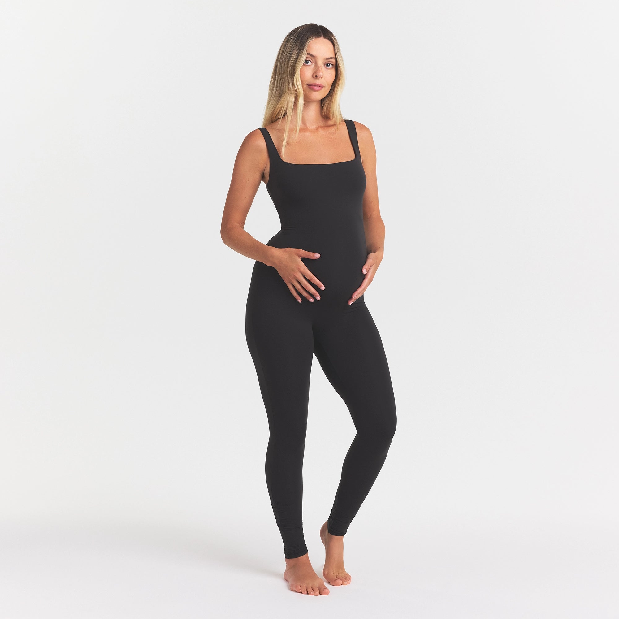 FITS EVERYBODY MATERNITY CATSUIT | ONYX ON A MODEL FRONT VIEW