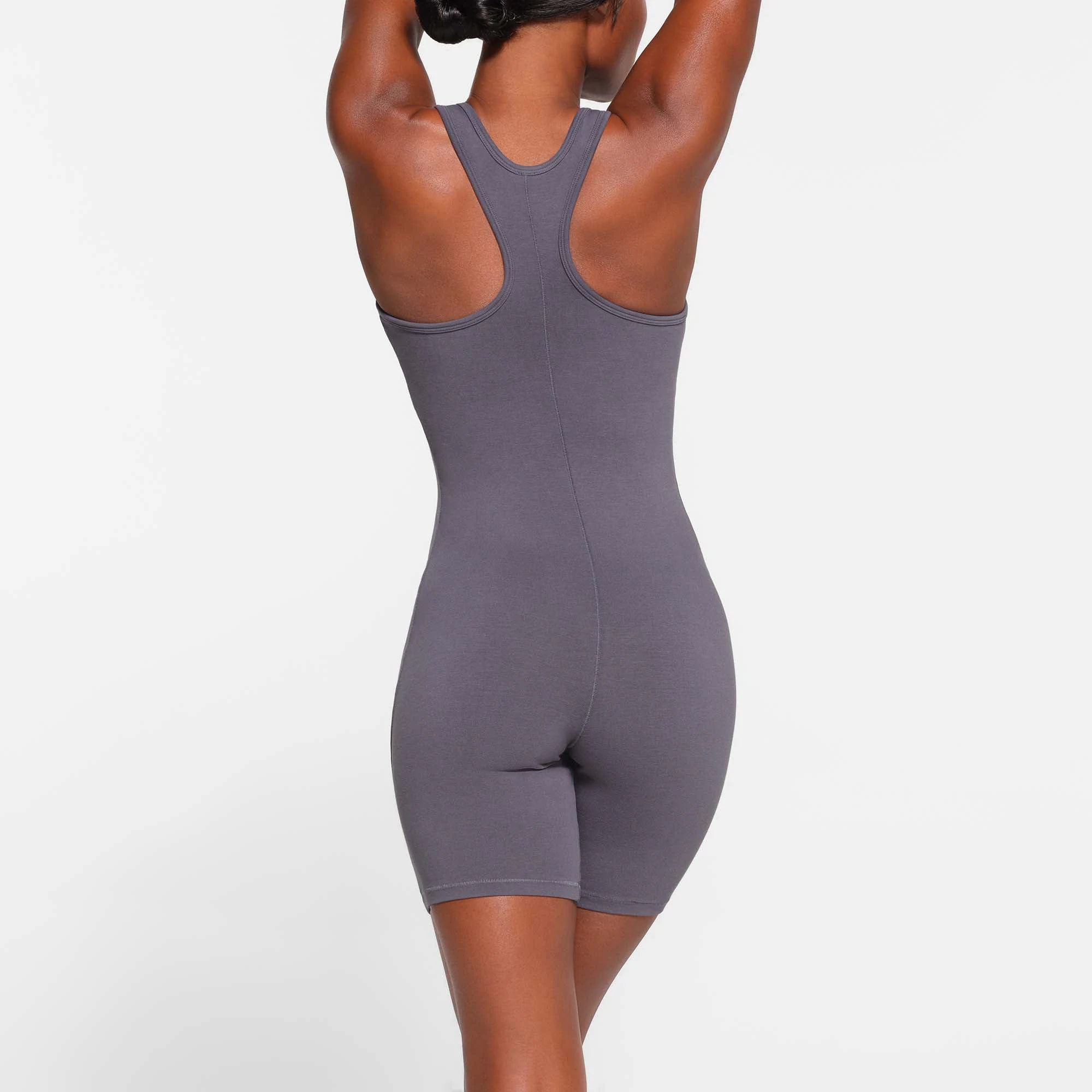 OUTDOOR MID THIGH ONESIE | STEEL BLUE ON A MODEL BACK VIEW