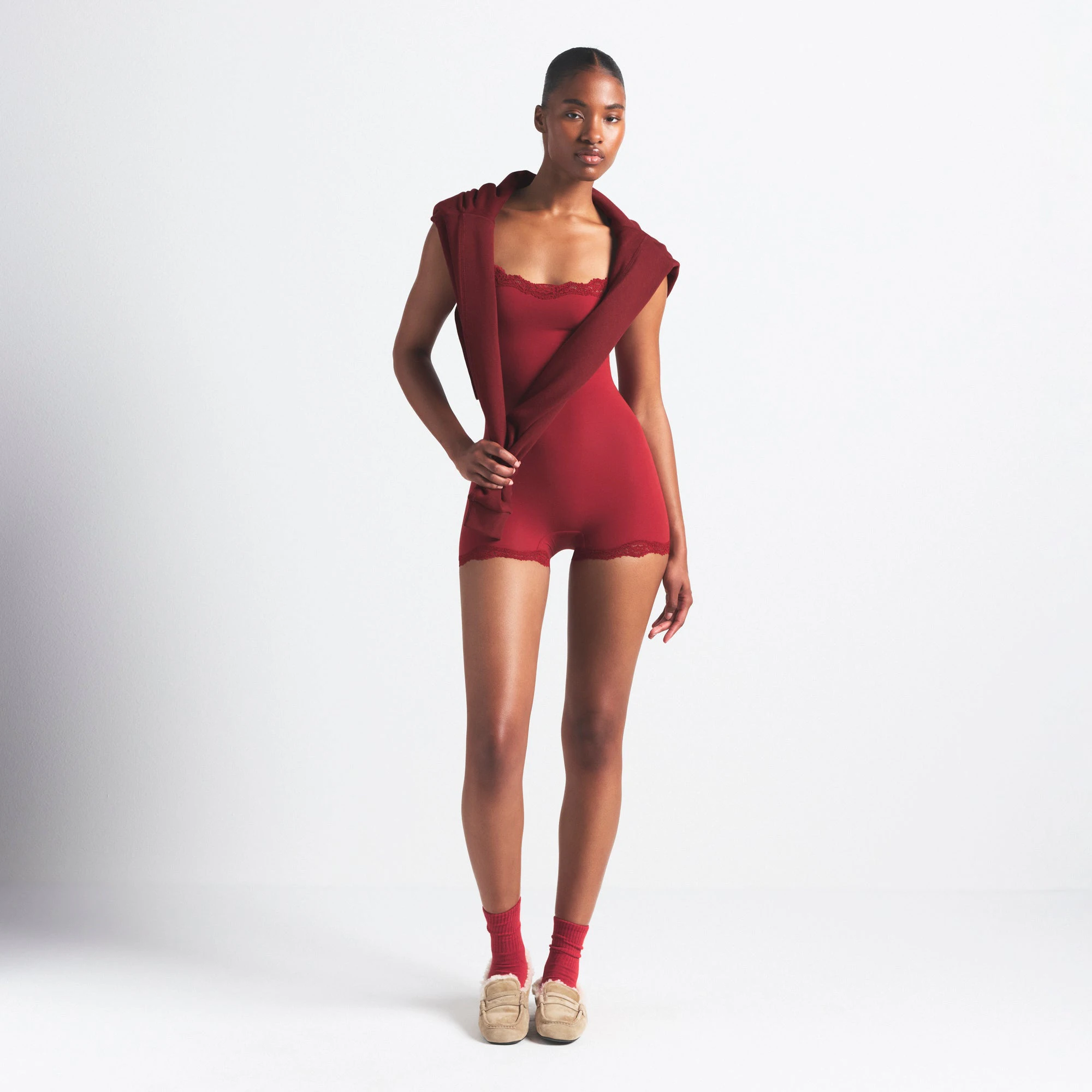 FITS EVERYBODY LACE ONESIE | BRICK ON A MODEL FRONT VIEW @ | FOCUS: 0.0, 1.0, 0.9