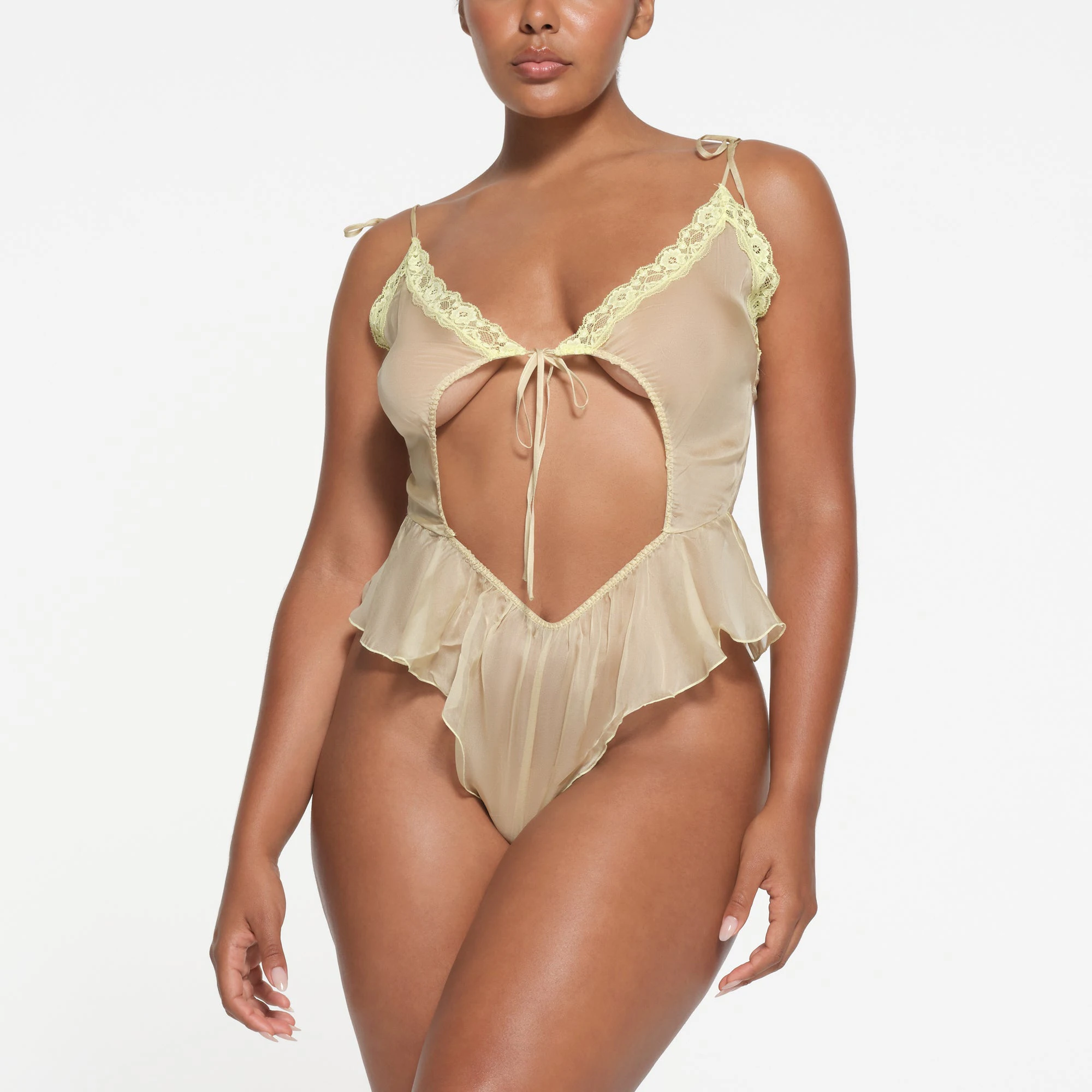 SKIMS ROMANCE TEDDY | SAGE ON A MODEL FRONT VIEW