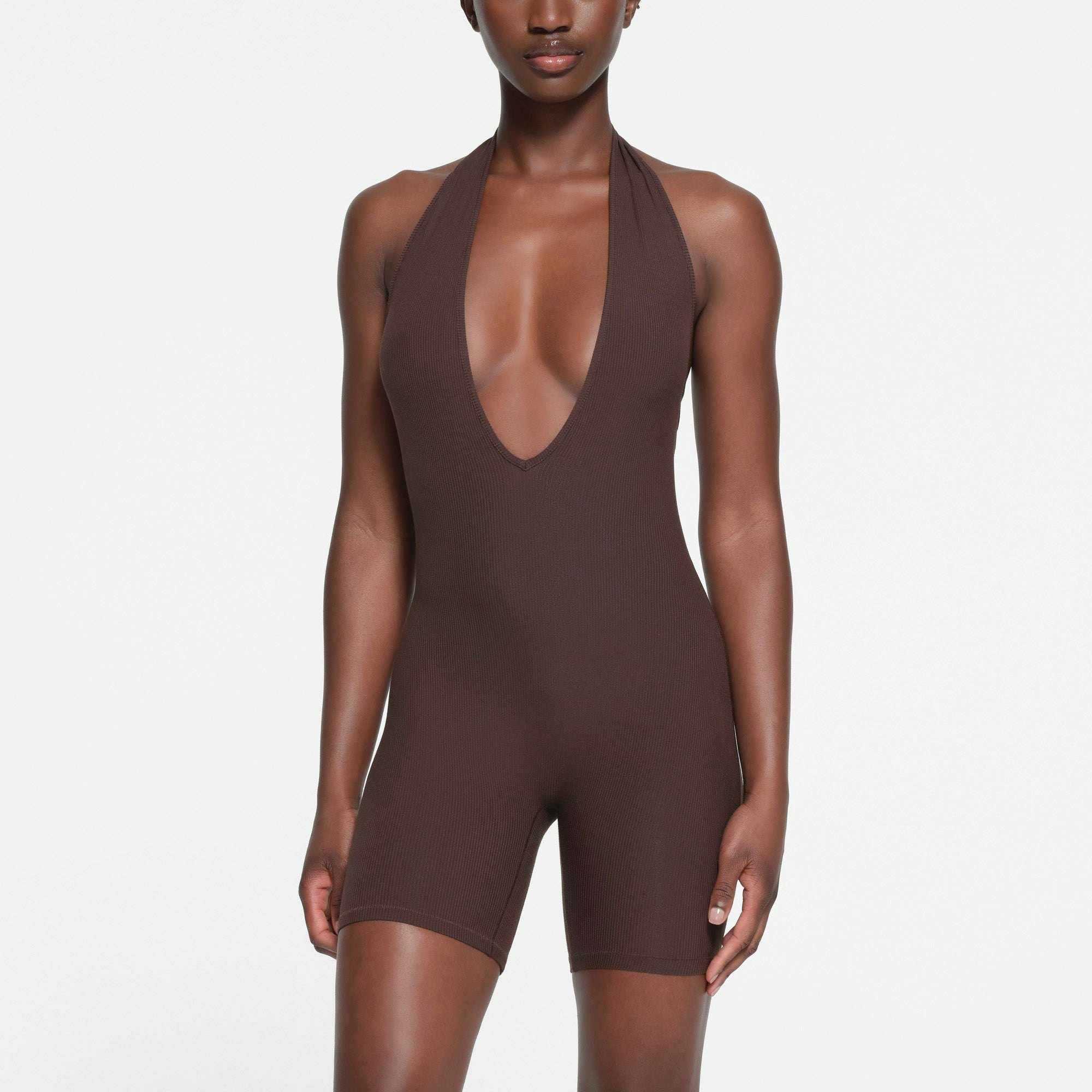 SOFT LOUNGE DEEP PLUNGE HALTER ONESIE | PHOENIX ON A MODEL FRONT VIEW