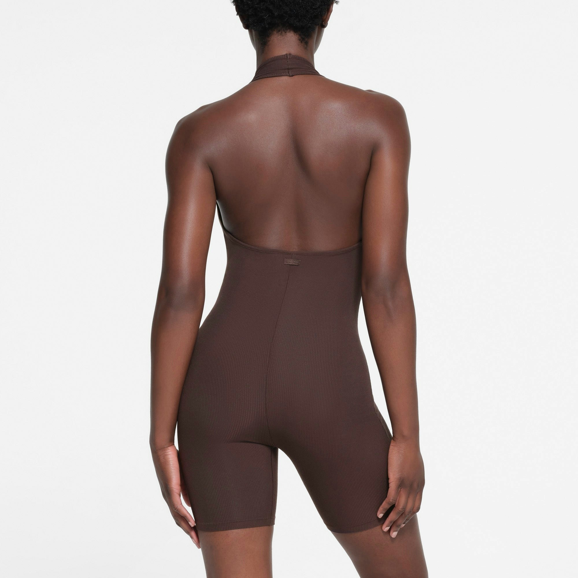 SOFT LOUNGE DEEP PLUNGE HALTER ONESIE | PHOENIX ON A MODEL BACK VIEW