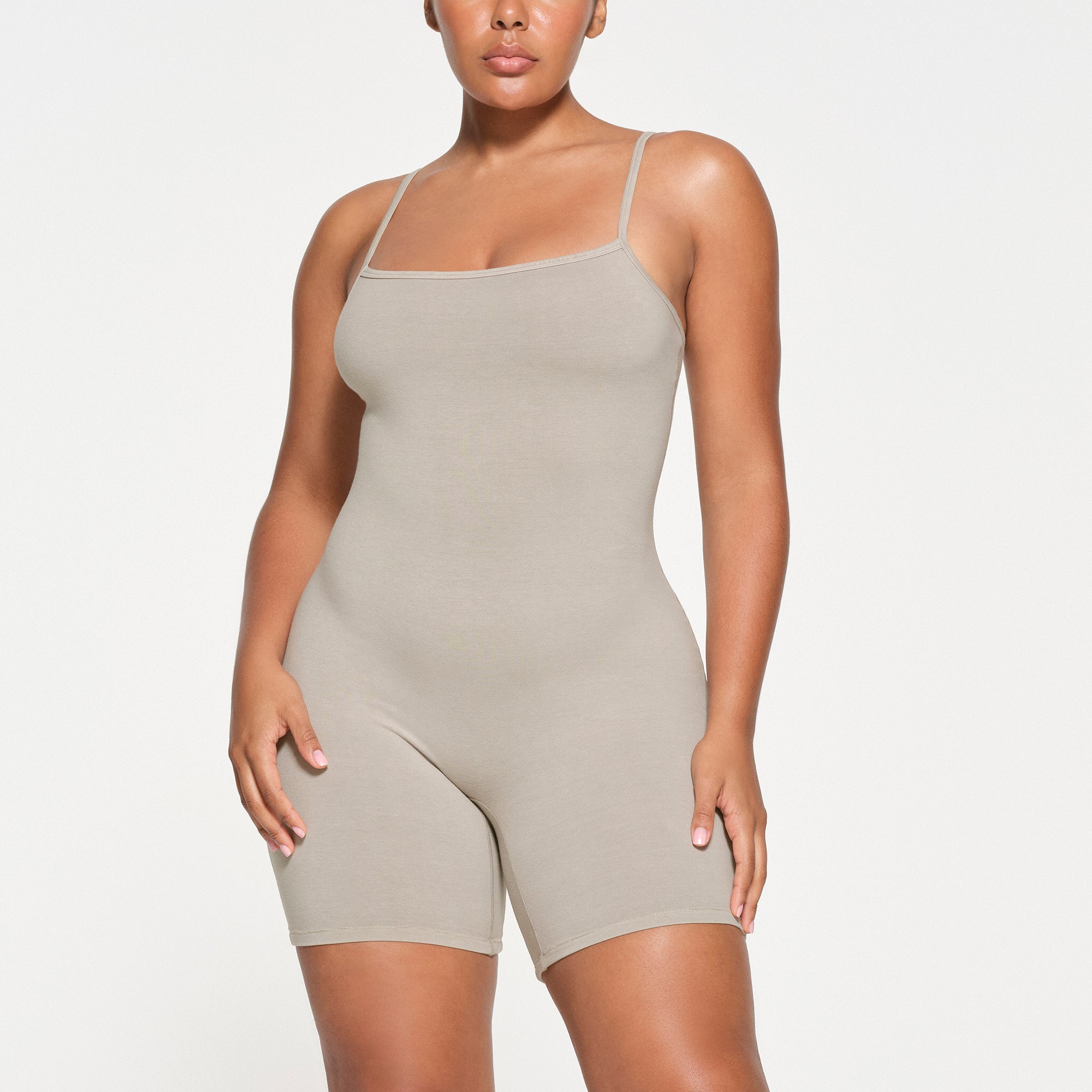 OUTDOOR CAMI ONESIE | STONE ON A MODEL FRONT VIEW