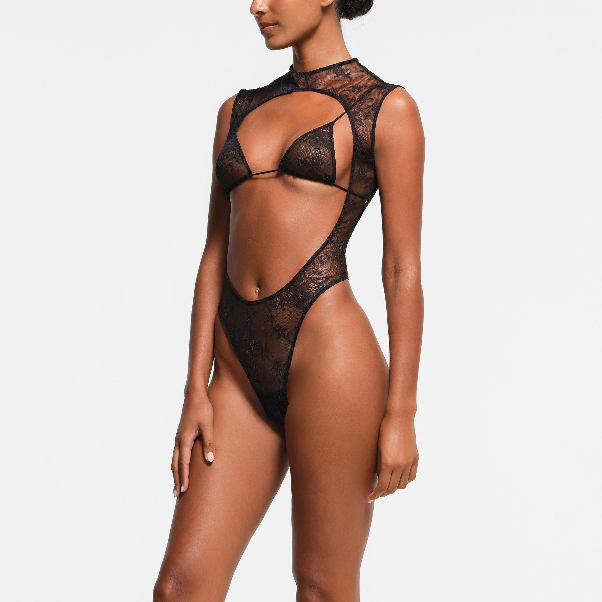 ULTRA FINE LACE OPEN FRONT TEDDY | ONYX ON A MODEL SIDE VIEW
