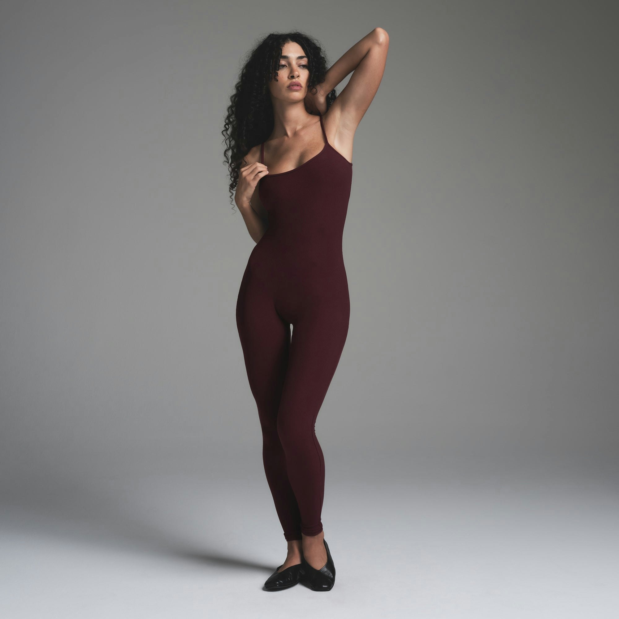 SOFT LOUNGE CAMI CATSUIT | BORDEAUX ON A MODEL FRONT VIEW | FOCUS: 0.0, 1.0, 0.9