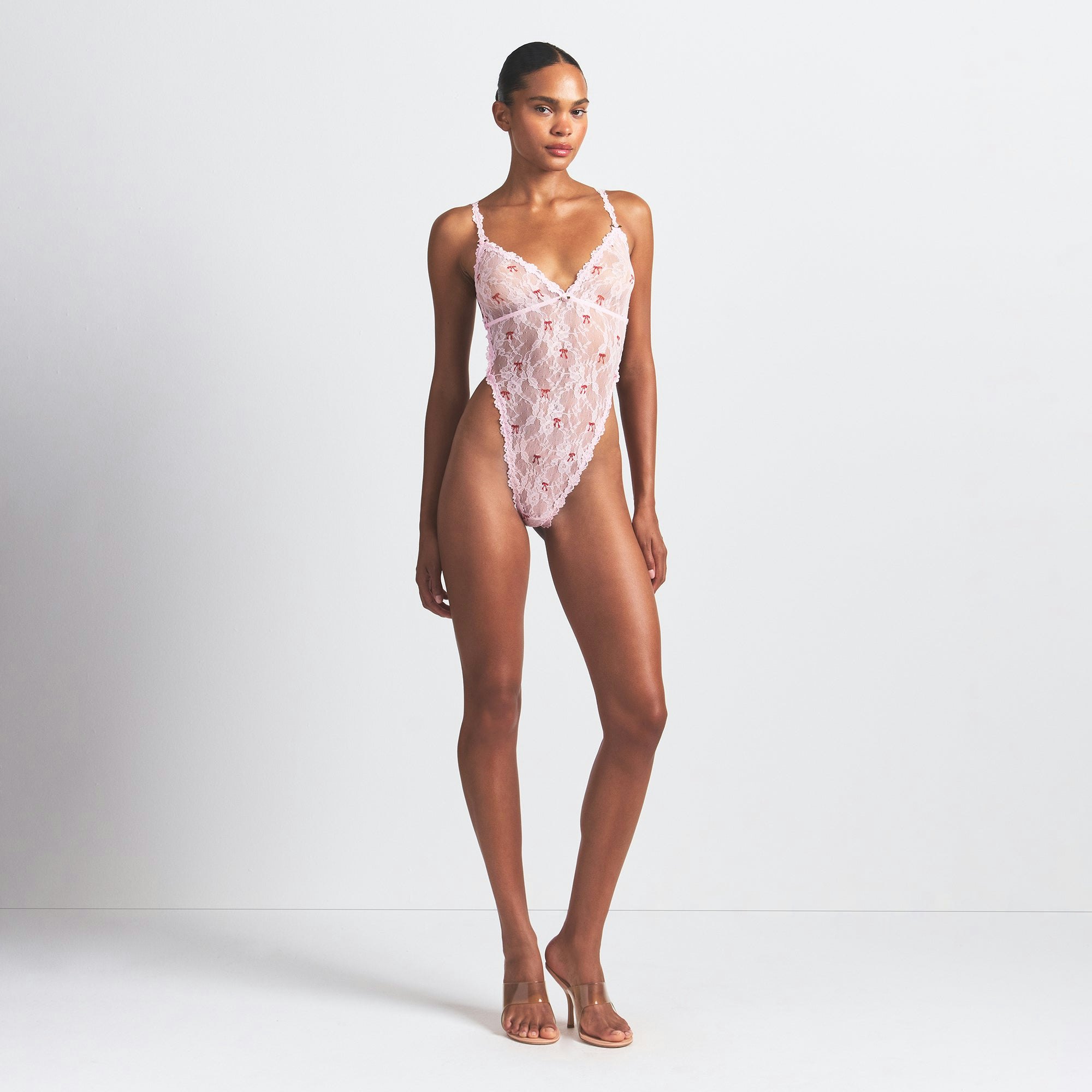 STRETCH LACE TEDDY | CHERRY BLOSSOM BOW PRINT ON A MODEL FRONT VIEW @ | FOCUS: 0.0, 1.0, 0.9