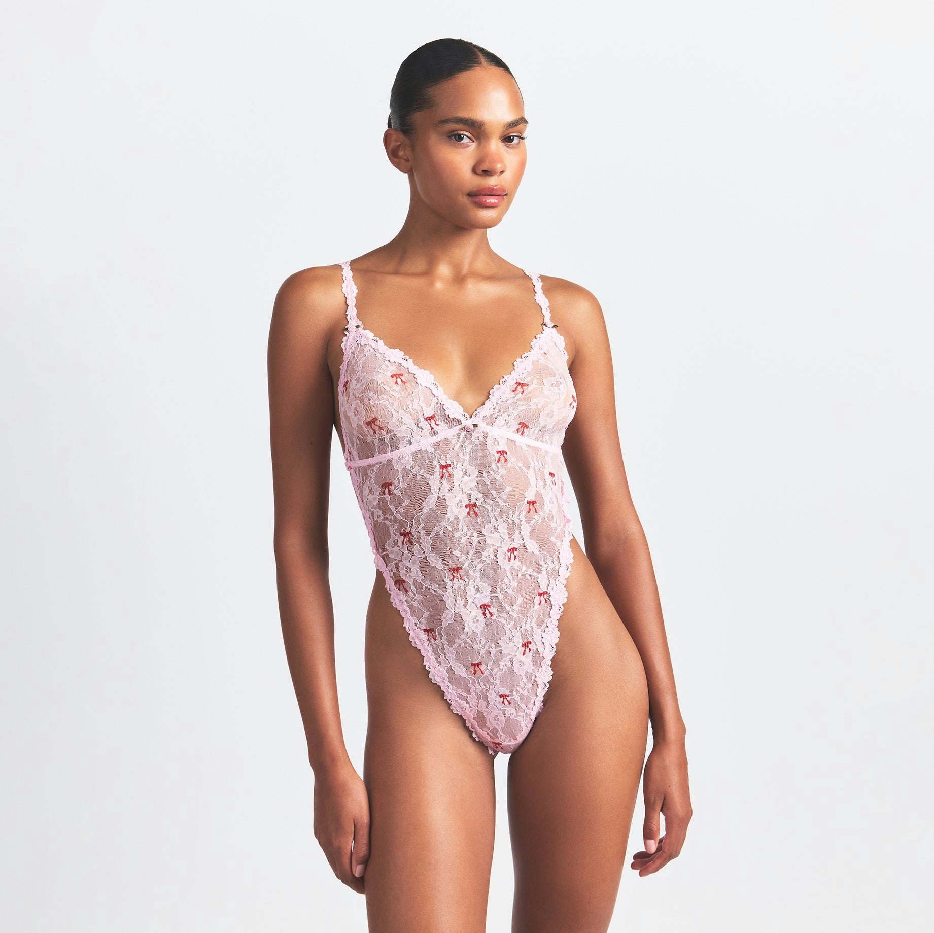 STRETCH LACE TEDDY | CHERRY BLOSSOM BOW PRINT ON A MODEL FRONT VIEW @ | FOCUS: 0.0, 1.0, 0.9