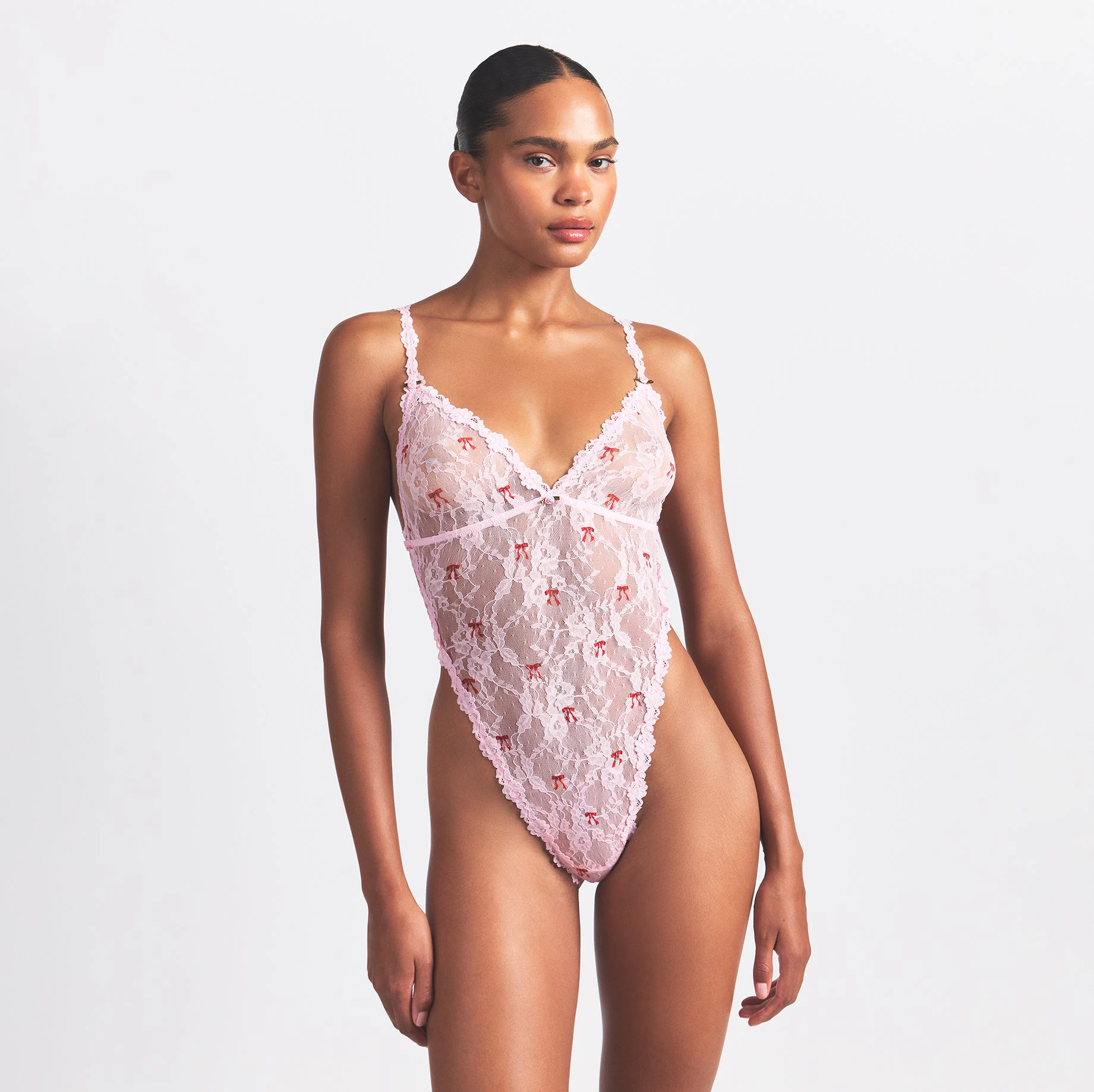 STRETCH LACE TEDDY | CHERRY BLOSSOM BOW PRINT ON A MODEL FRONT VIEW @ | FOCUS: 0.0, 1.0, 0.9