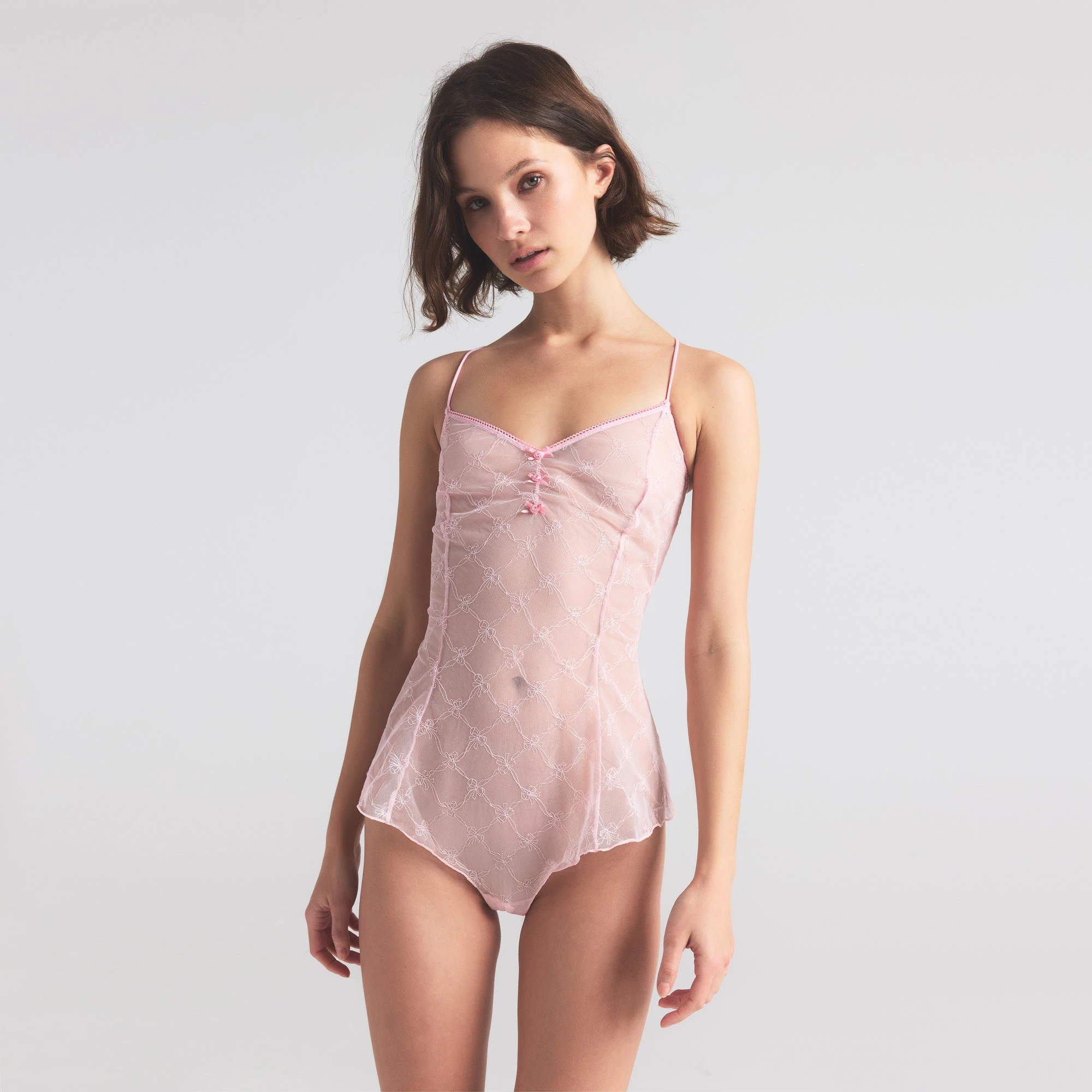 SPRING INTIMATES TEDDY | CHERRY BLOSSOM BOW TULLE ON A MODEL SIDE VIEW | FOCUS: 0.0, 1.0, 0.9
