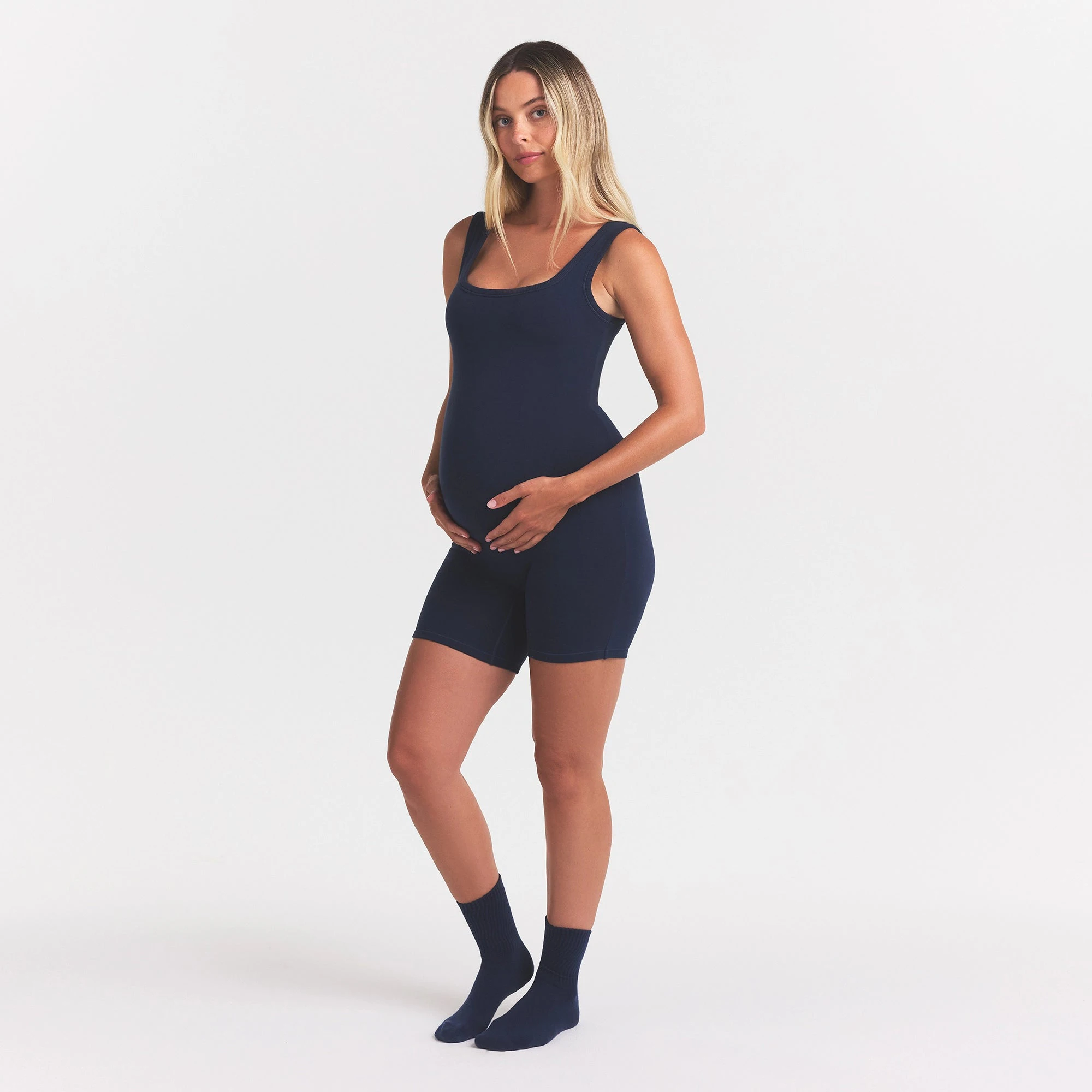 COTTON JERSEY MATERNITY ONESIE | NAVY ON A MODEL FRONT VIEW @ | FOCUS: 0.0, 1.0, 0.9