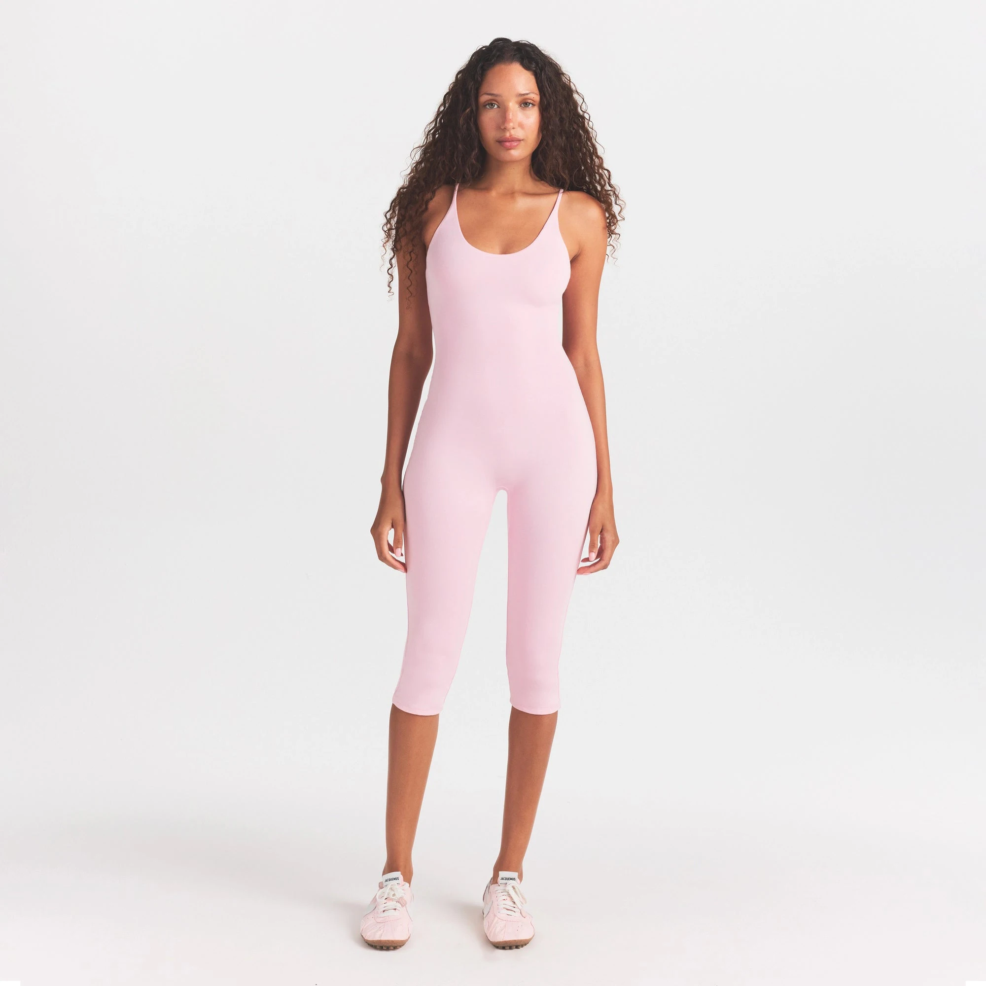 SMOOTH LAYERS CAPRI CATSUIT | PEONY ON A MODEL FRONT VIEW @ | FOCUS: 0.0, 1.0, 0.9