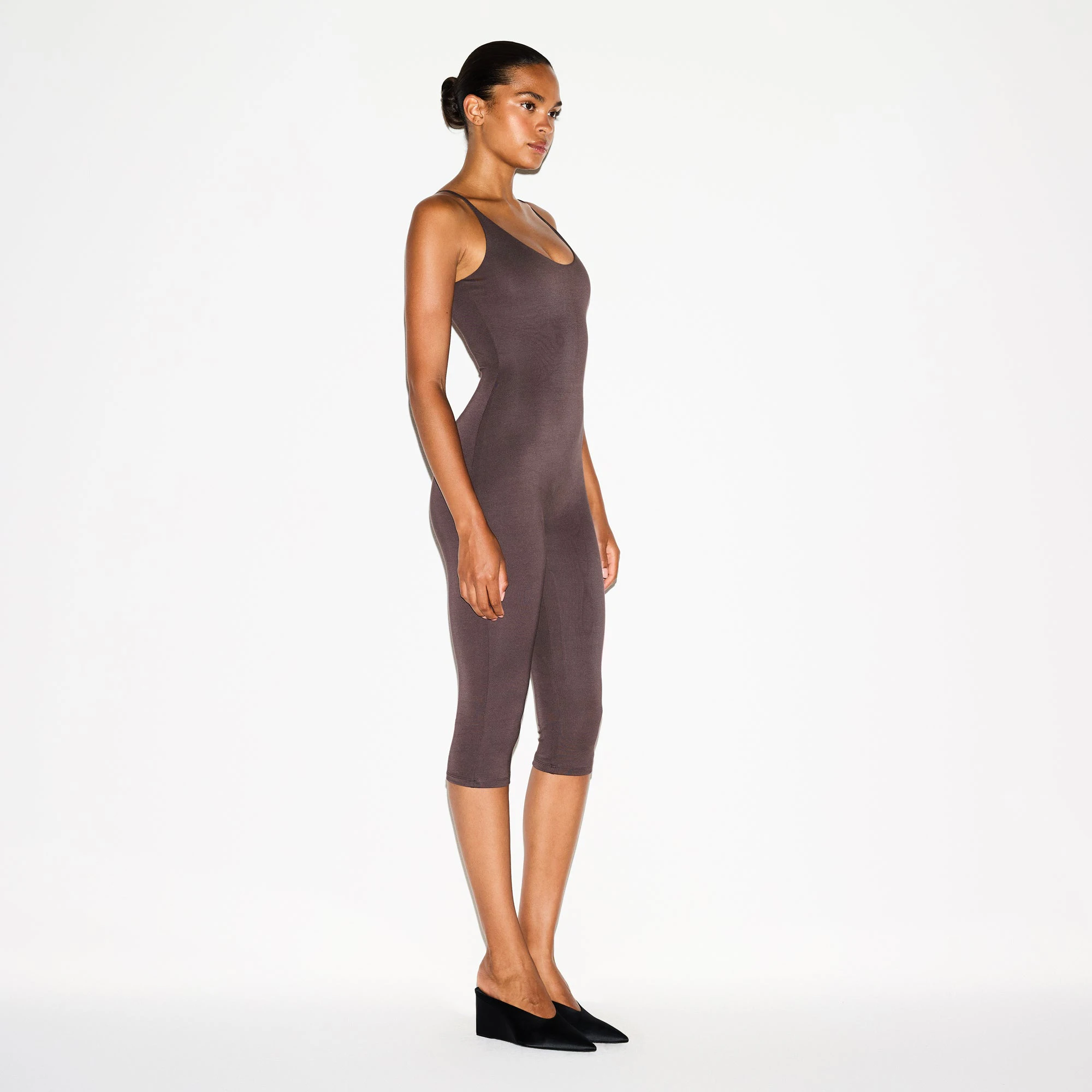 SMOOTH LAYERS CAPRI CATSUIT | RAISIN ON A MODEL FRONT VIEW @ | FOCUS: 0.0, 1.0, 0.9