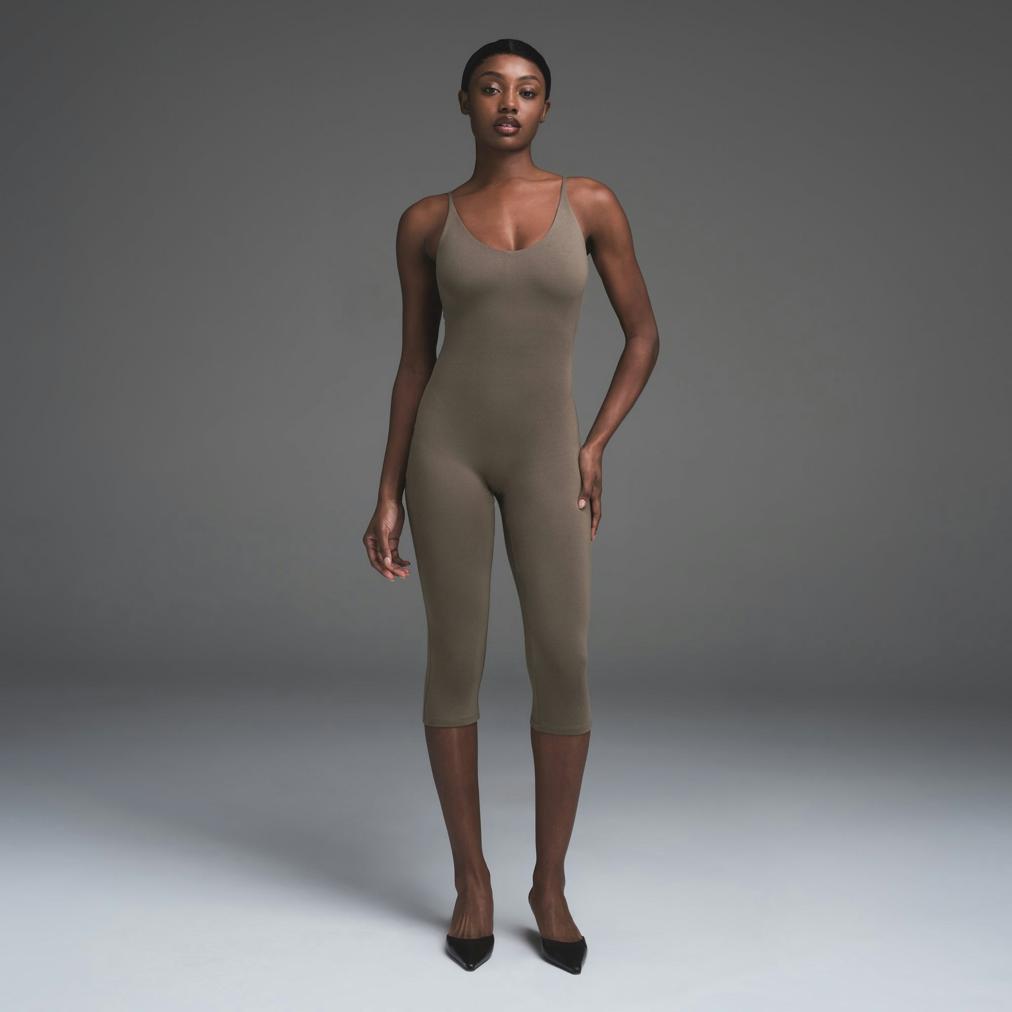 SMOOTH LOUNGE CAPRI CATSUIT | TRUFFLE  ON A MODEL BACK VIEW | FOCUS: 0.0, 1.0, 0.9