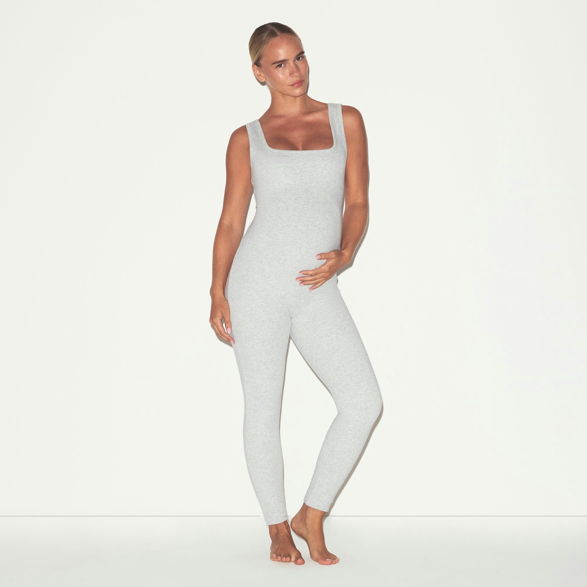 COTTON JERSEY MATERNITY CATSUIT | LIGHT HEATHER GREY ON A MODEL FRONT VIEW @ | FOCUS: 0.0, 1.0, 0.9